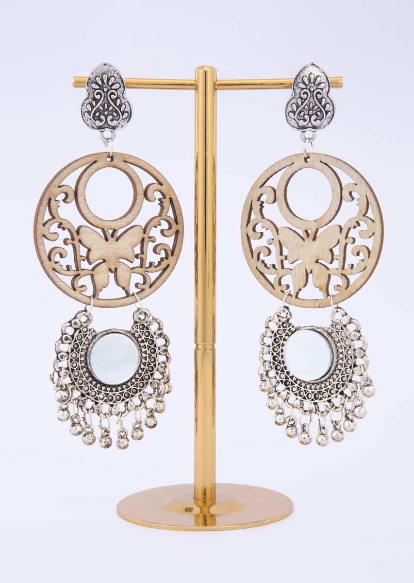 Oxidized silver earring with cut out wooden layer only on Kalki
