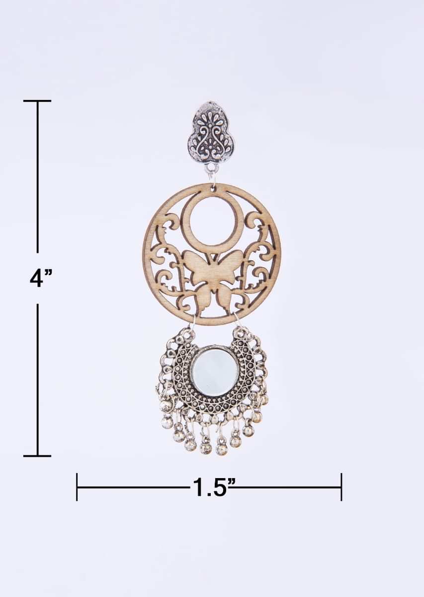 Oxidized silver earring with cut out wooden layer only on Kalki