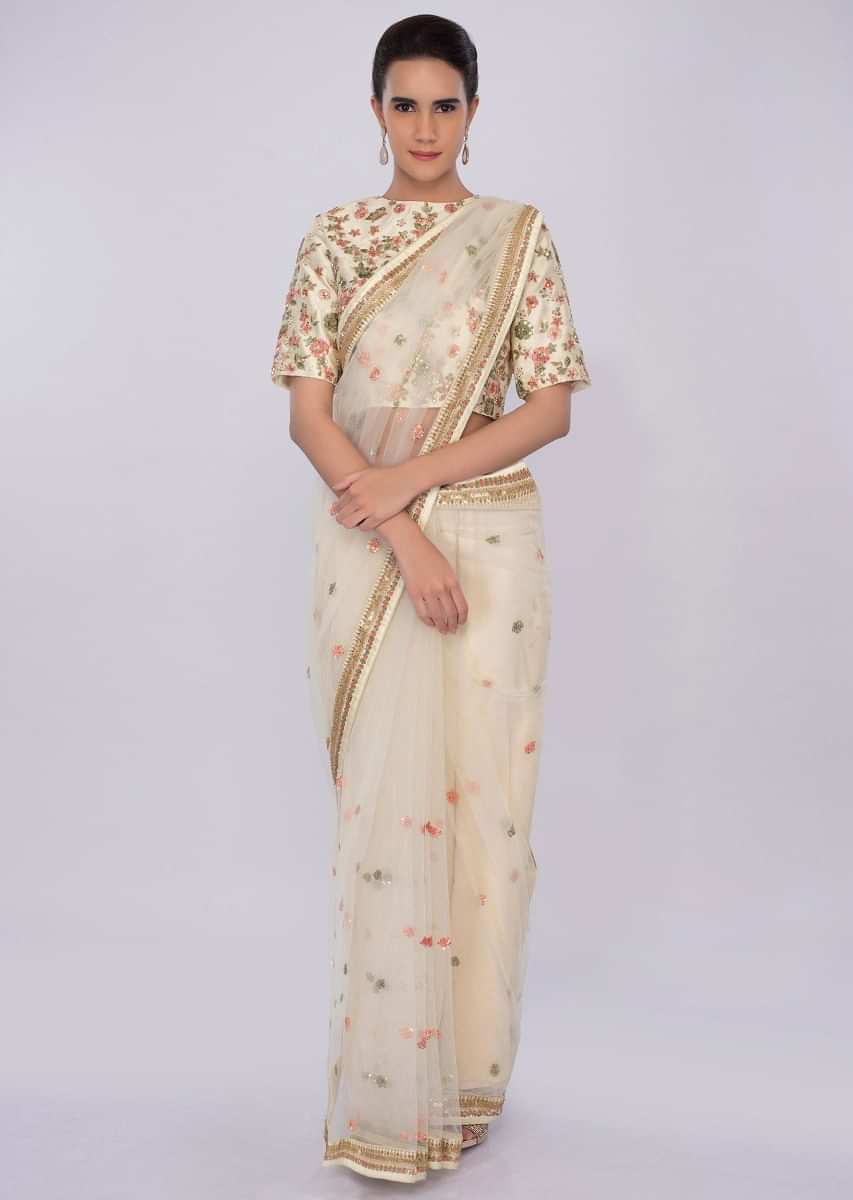 Pale Lemon Yellow Net Saree With Floral Embroidery And Butti Online - Kalki Fashion