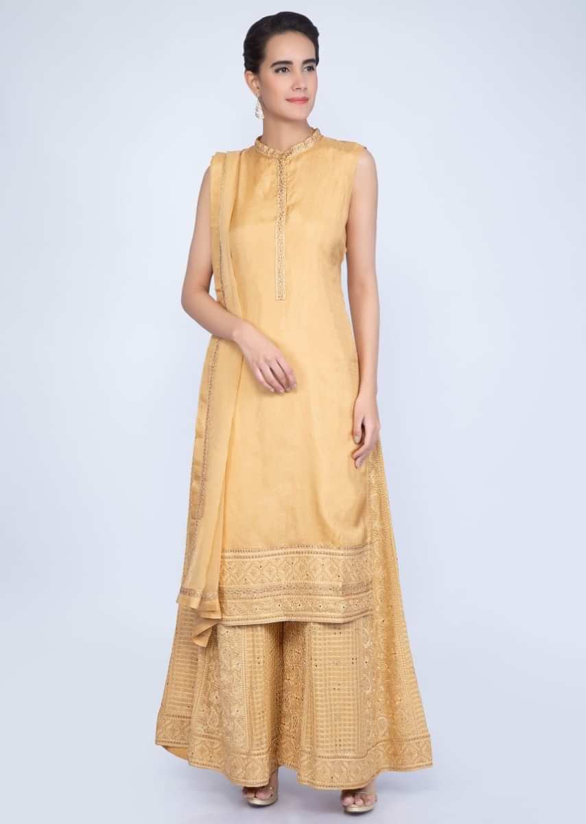 Pale mustard straight suit with embroidered palazzo and chiffon dupatta only on Kalki