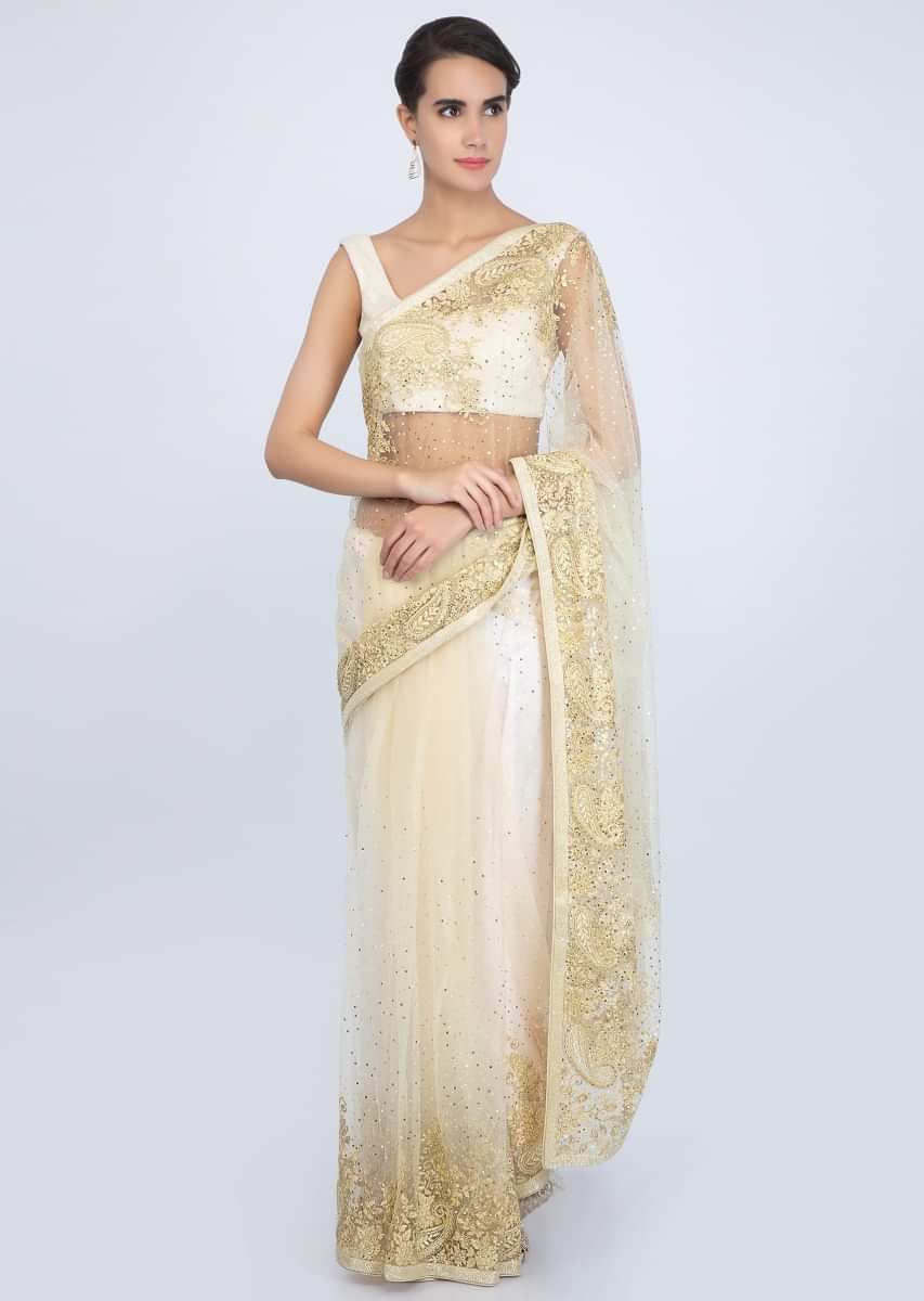 Pale yellow net saree with embroidered border and pallo only on Kalki