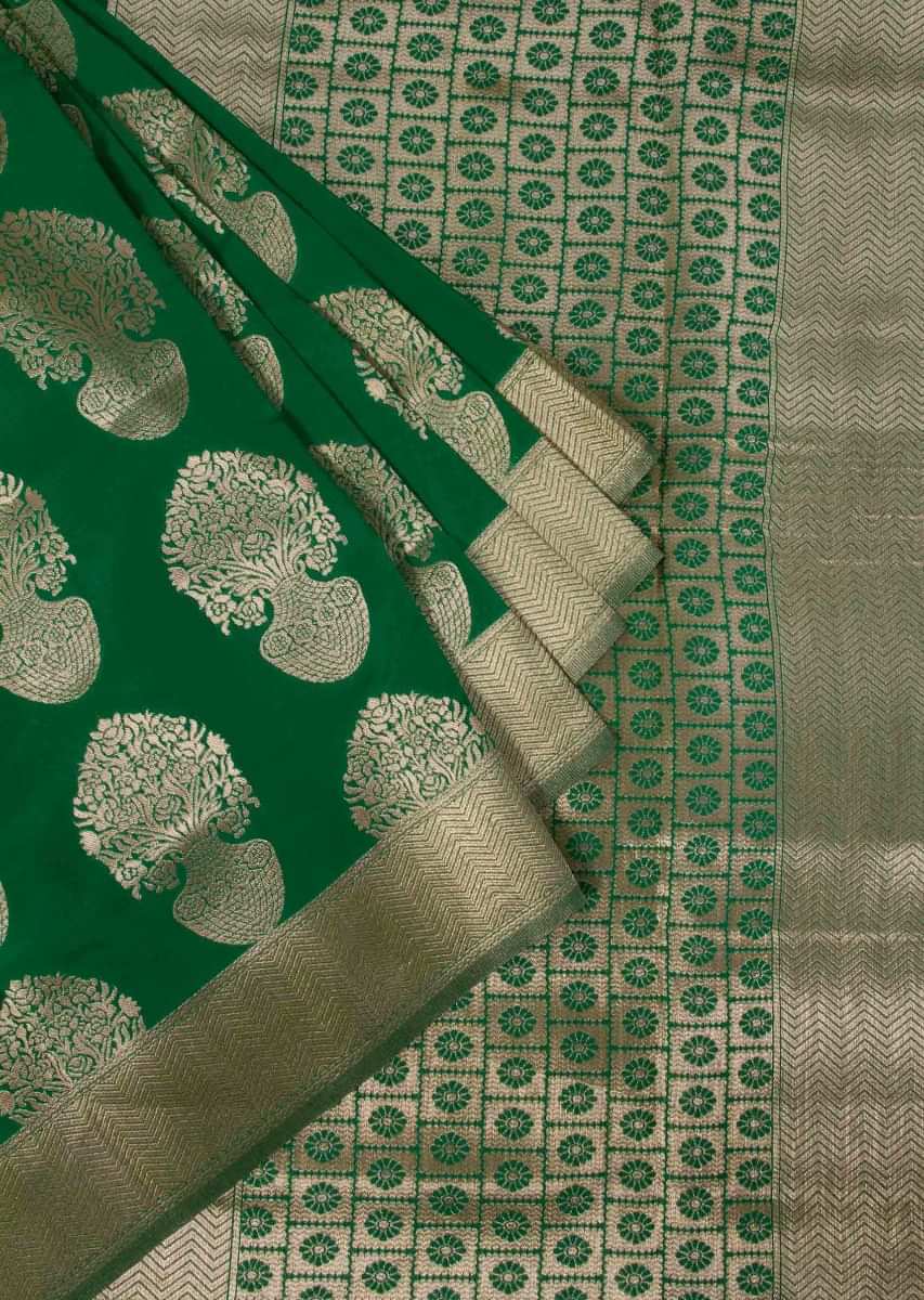 Parakeet green banarasi silk saree in floral pot weaved butti 