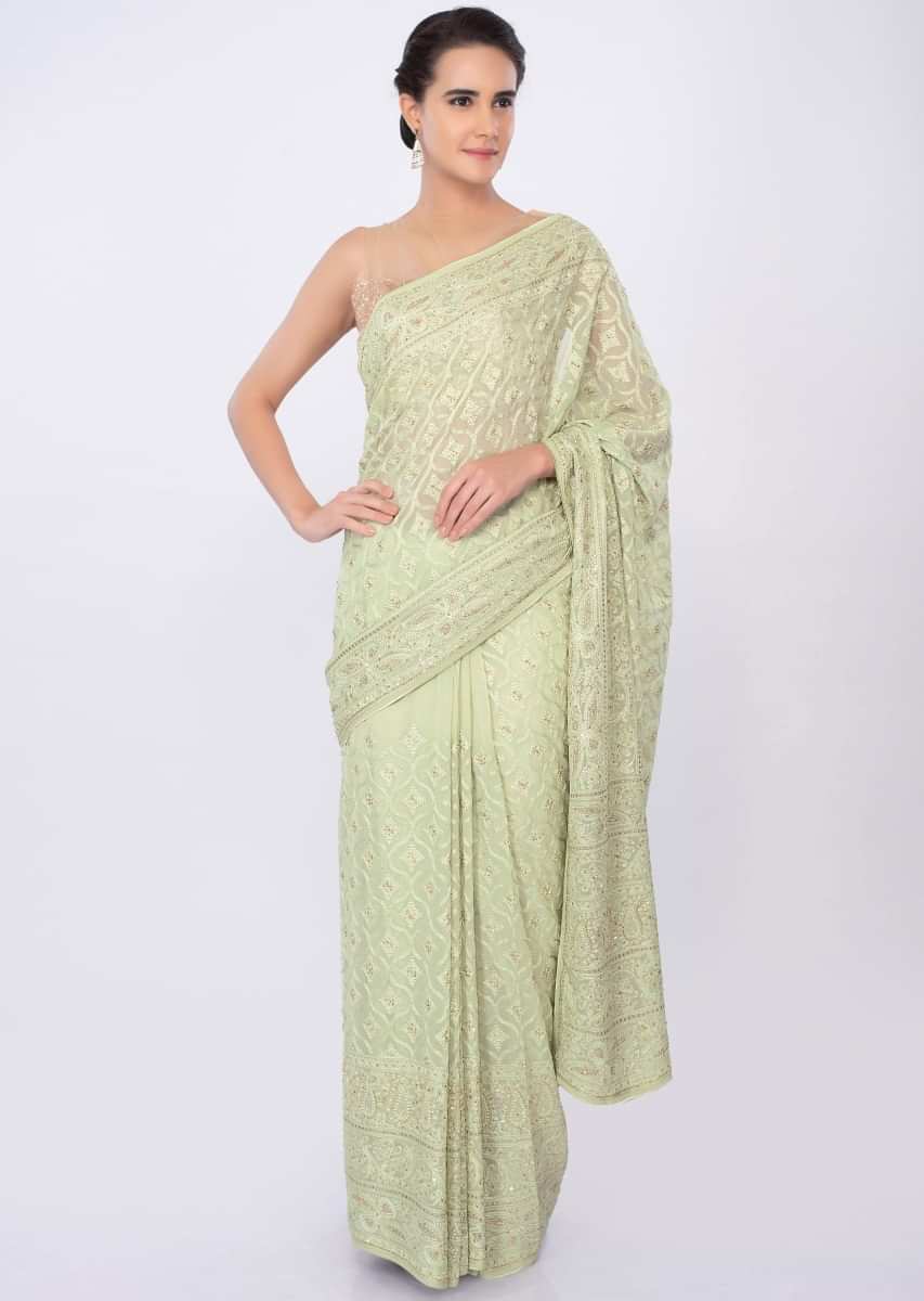 Paris green georgette saree in lucknowi embroidery  only on kalki