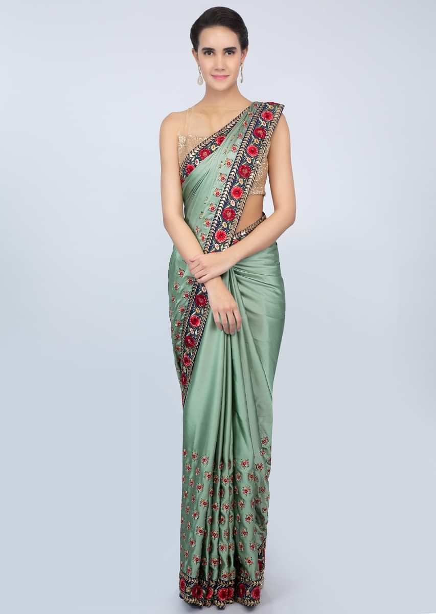 Paris green satin saree in multi color floral resham embroidery only on kalki