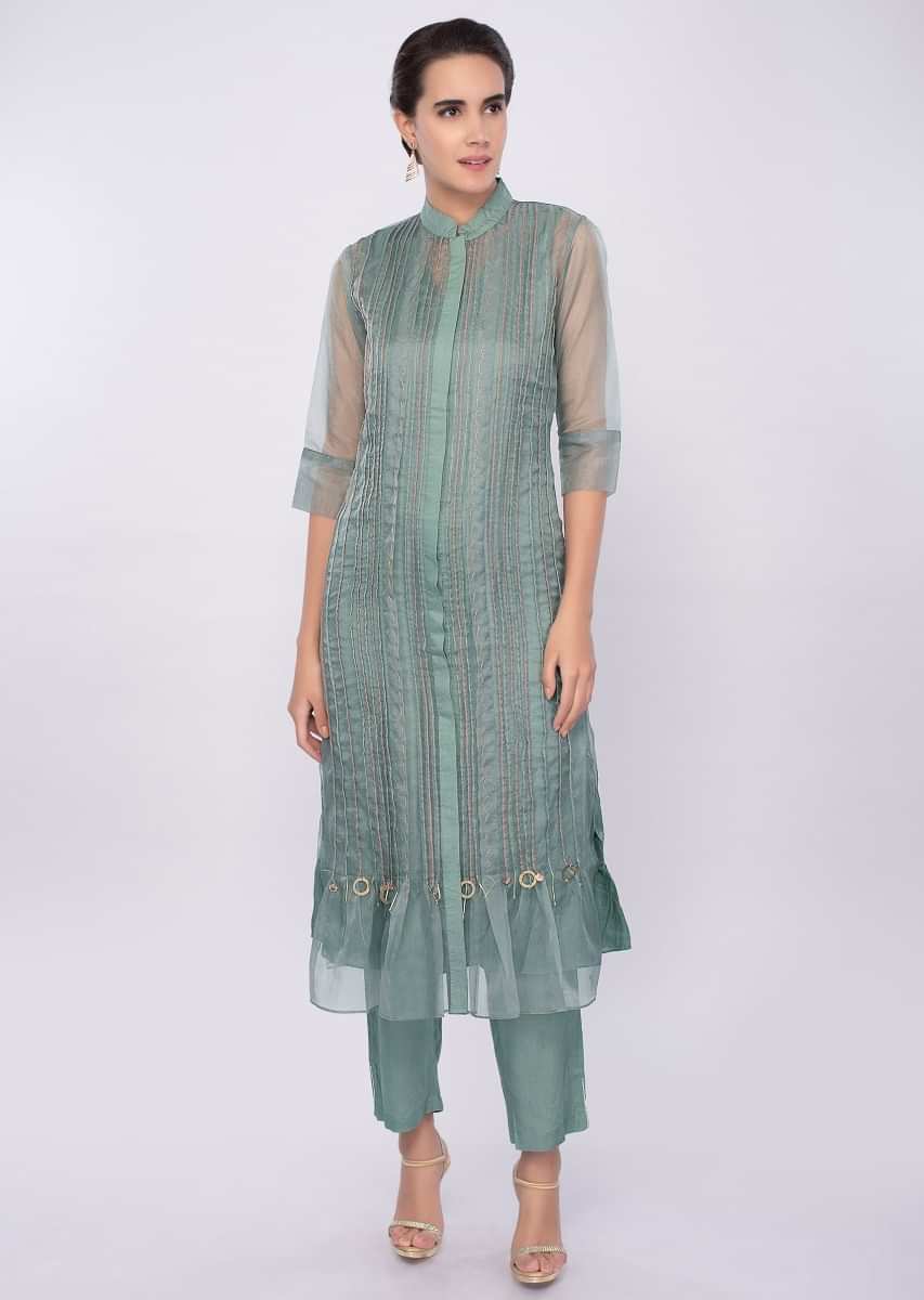 Paris green three piece suit designed with pleats only on Kalki