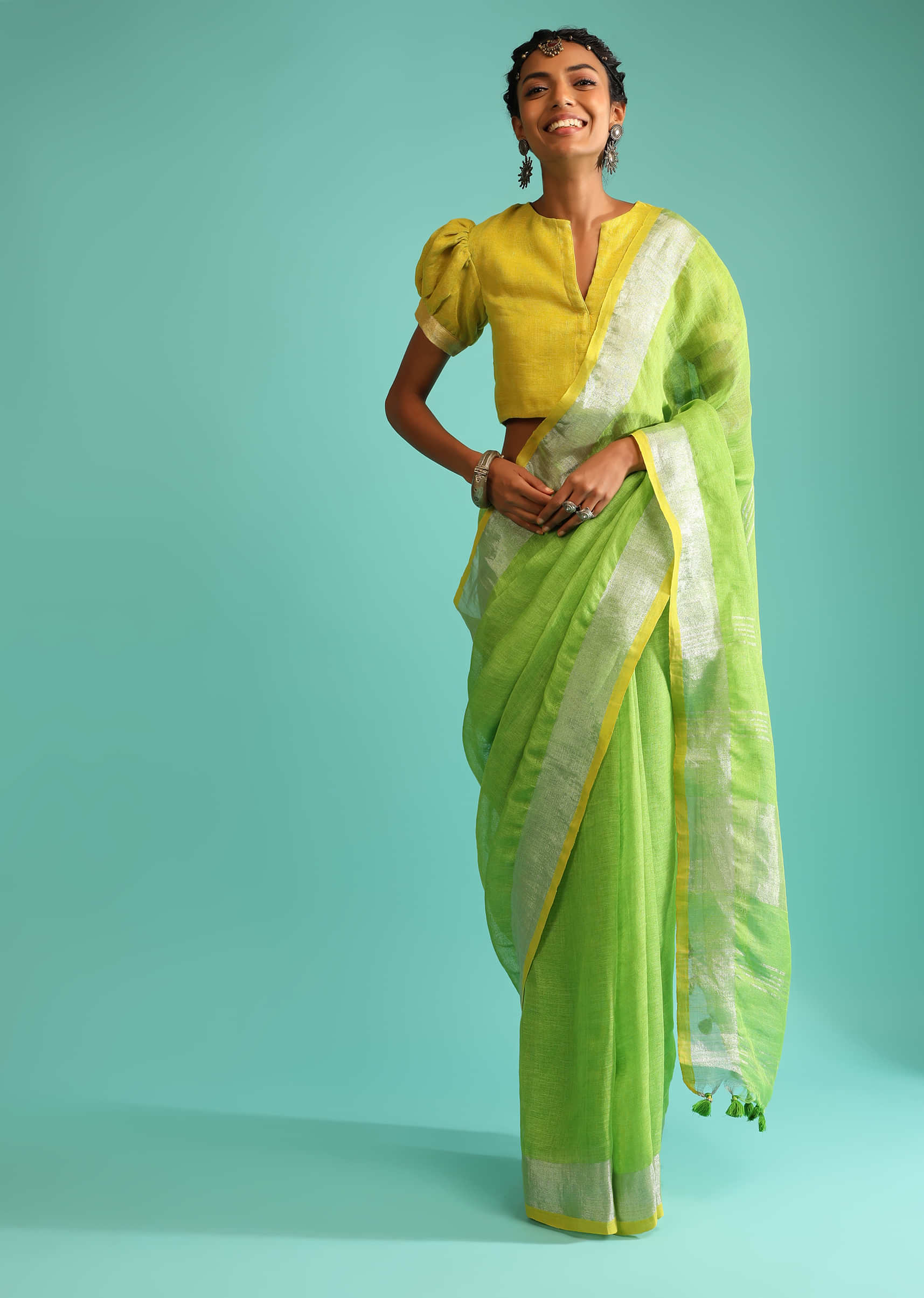 Parrot Green Saree In Linen With Silver Brocade Border And Striped Pallu Along With Yellow Unstitched Blouse  