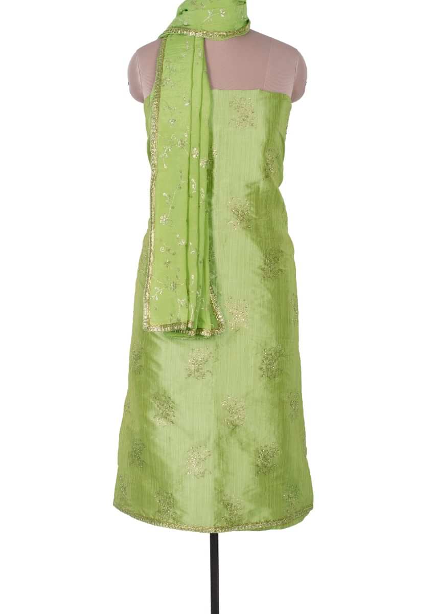 Parrot green shimmer santoon unstitch suit in floral weaved butti