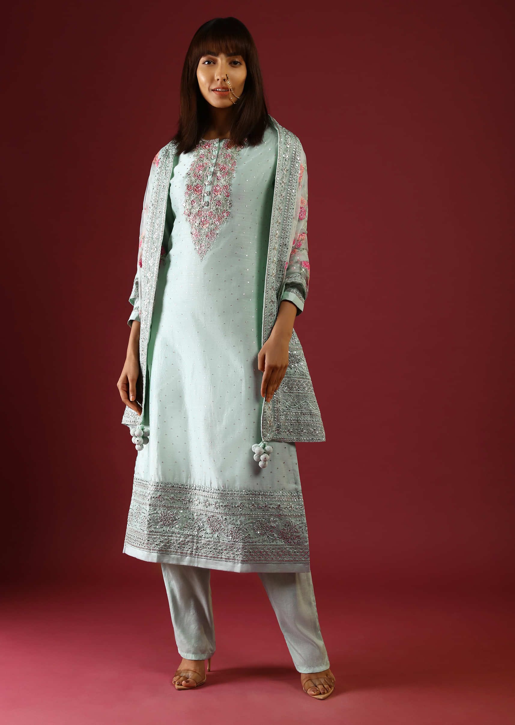 Pastel Green Straight Cut Suit With Multi Colored Thread Embroidered Floral Motifs On The Yoke And Organza Dupatta  