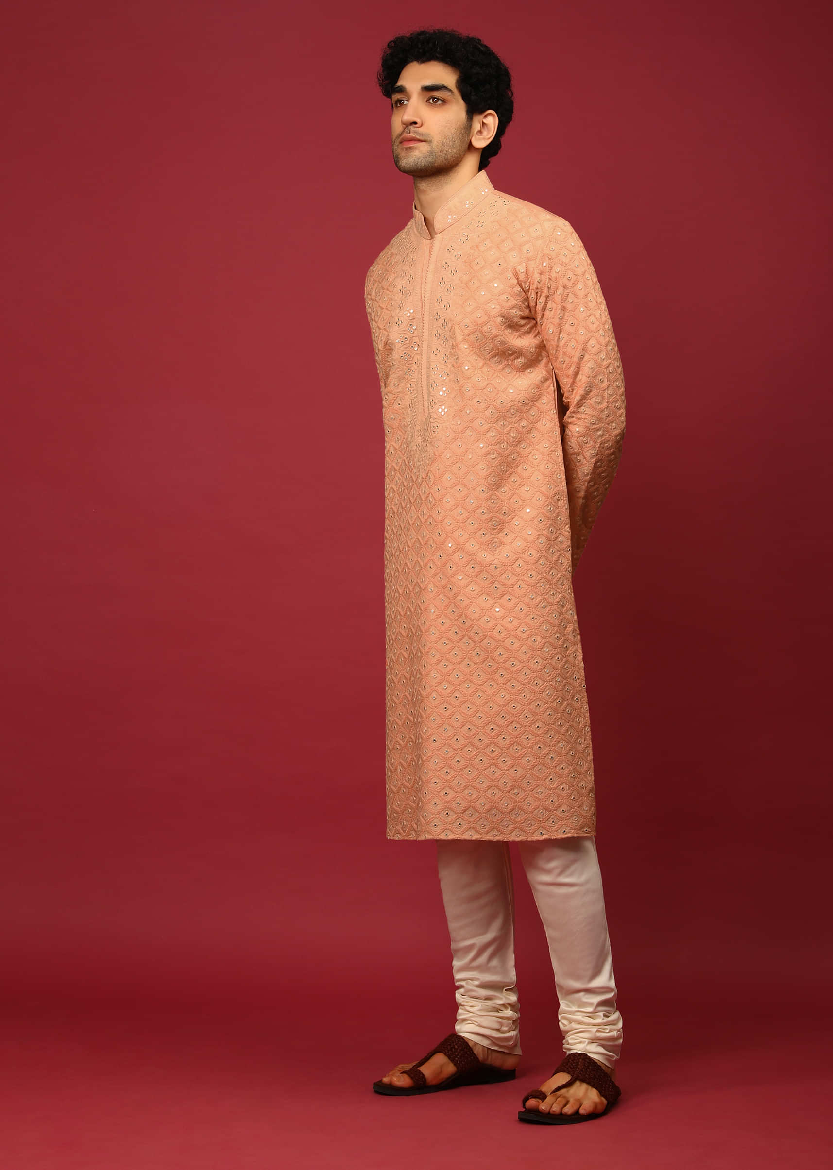 Pastel Peach Kurta Set In Raw Silk Heavily Embroidered With Resham And Mirror Embroidered Geometric Jaal  