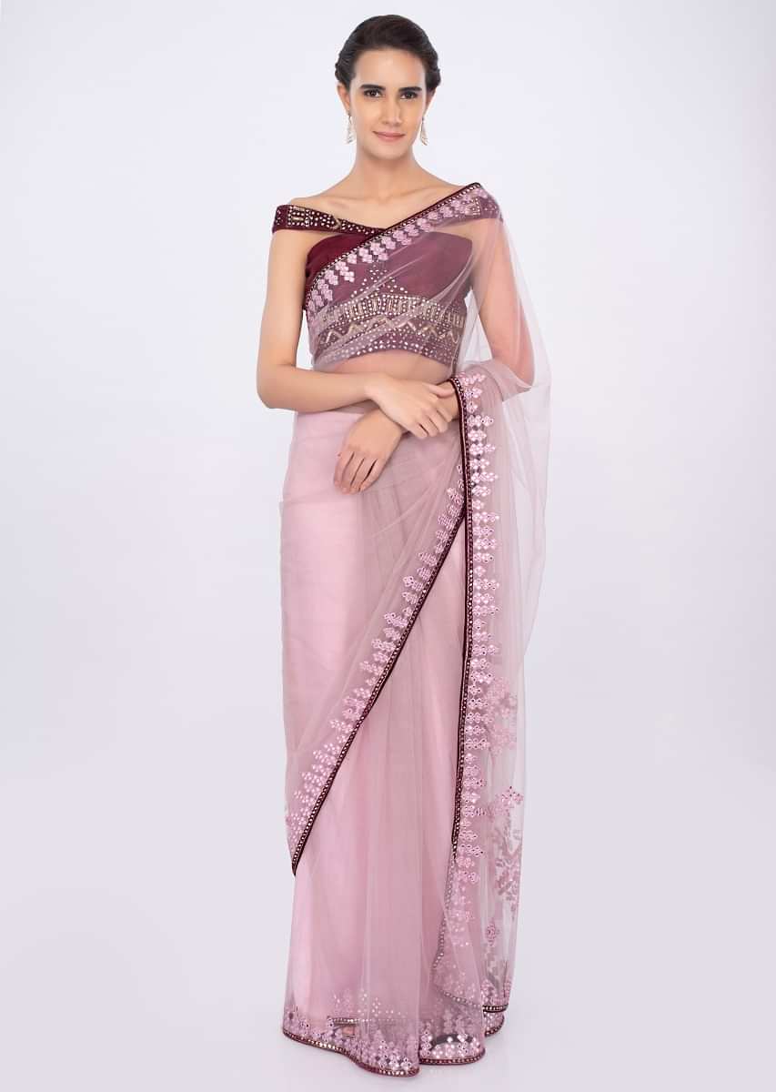 Pastel pink draped net saree with plum raw silk off shoulder blouse only on kalki
