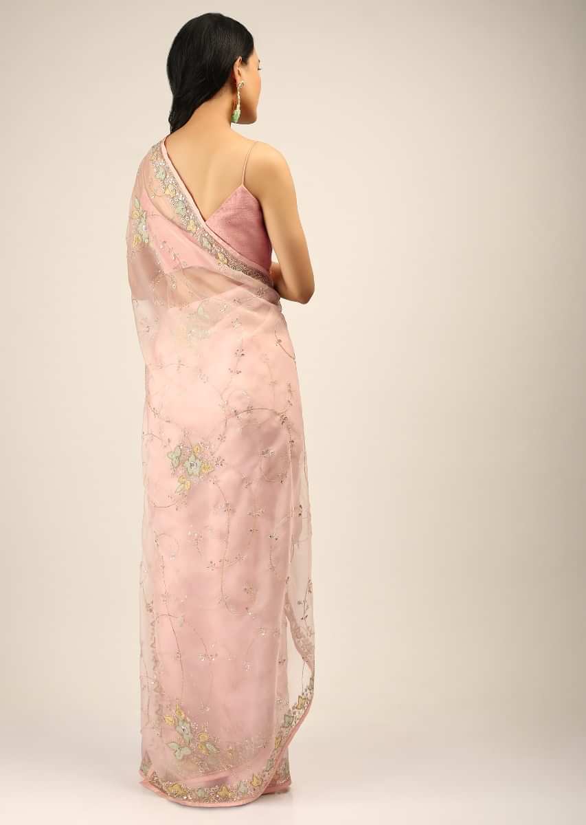 Pastel Pink Saree In Organza With Multi Colored Applique Flowers On The Border And Cut Dana Accents  