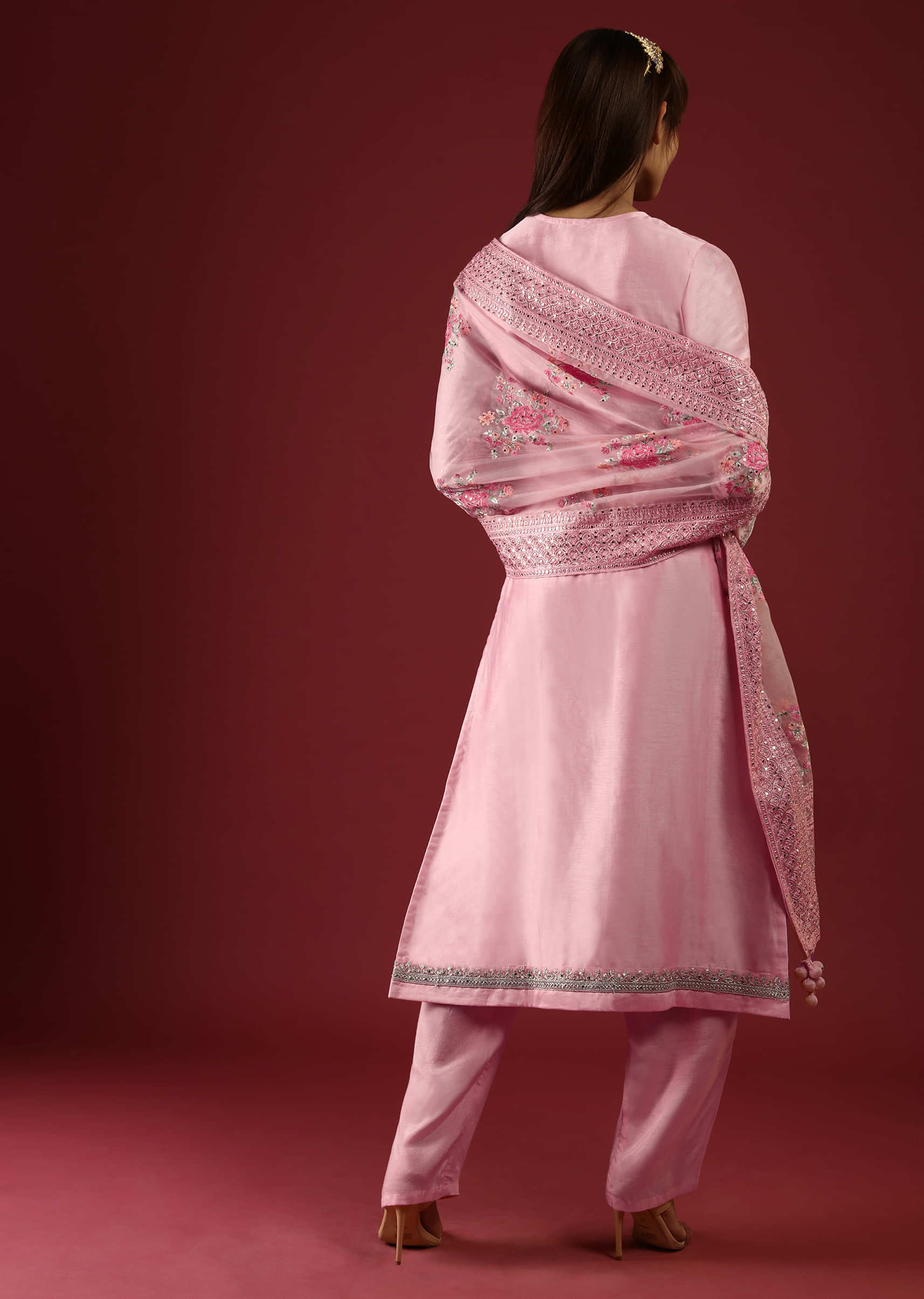 Pastel Pink Straight Cut Suit With Mirror Work On The Yoke And An Organza Dupatta With Multi Colored Thread Embroidered Floral Motifs  