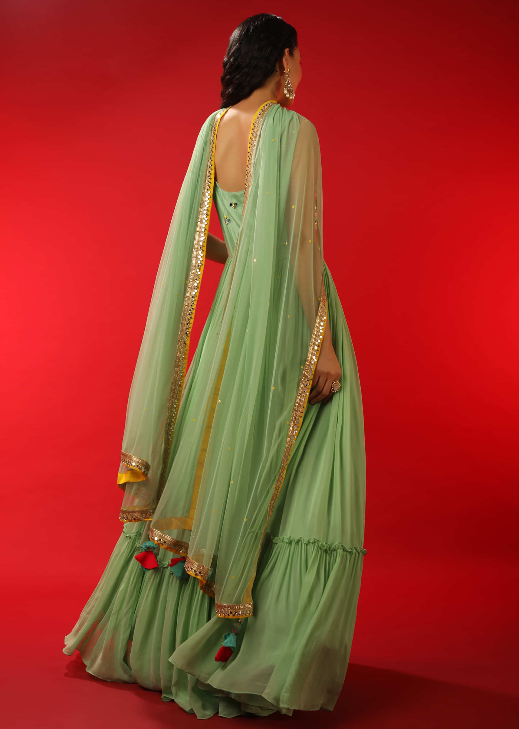 Pastel Green Anarkali Suit With Multi Colored Sequins And Mirror Able Work In Floral Motifs  