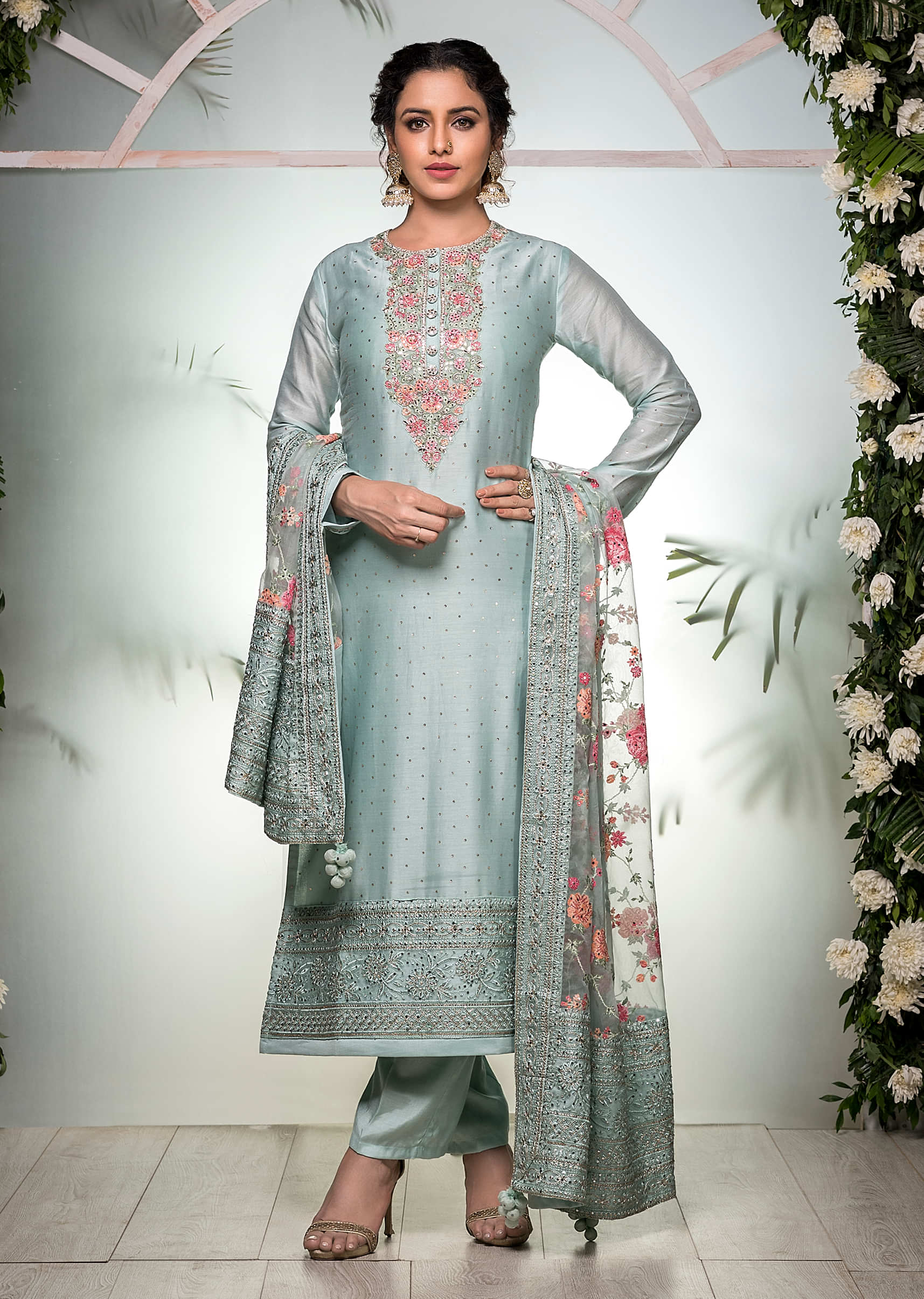Pastel Green Straight Cut Suit With Multi Colored Thread Embroidered Floral Motifs On The Yoke And Organza Dupatta  