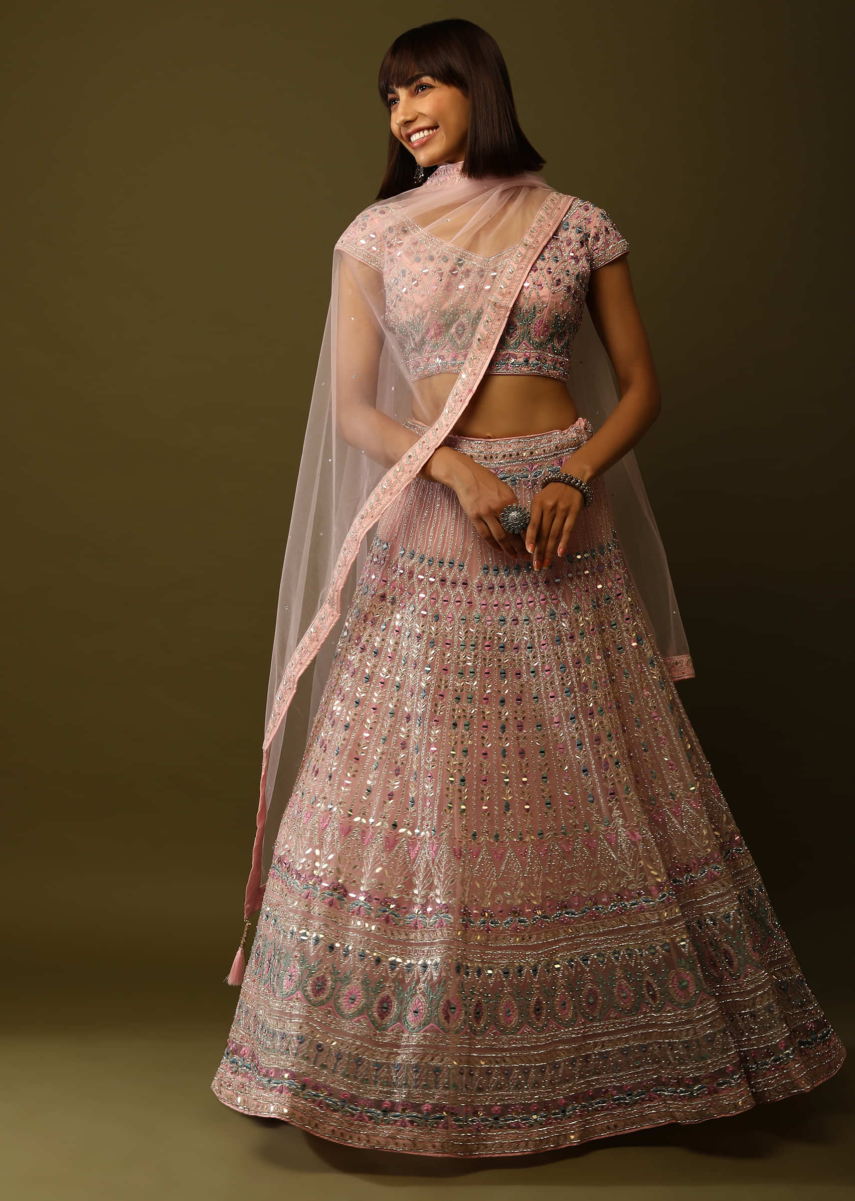 Pastel Pink Lehenga Choli In Net With Multi Colored Resham And Abla embroidery Mughal Motifs  