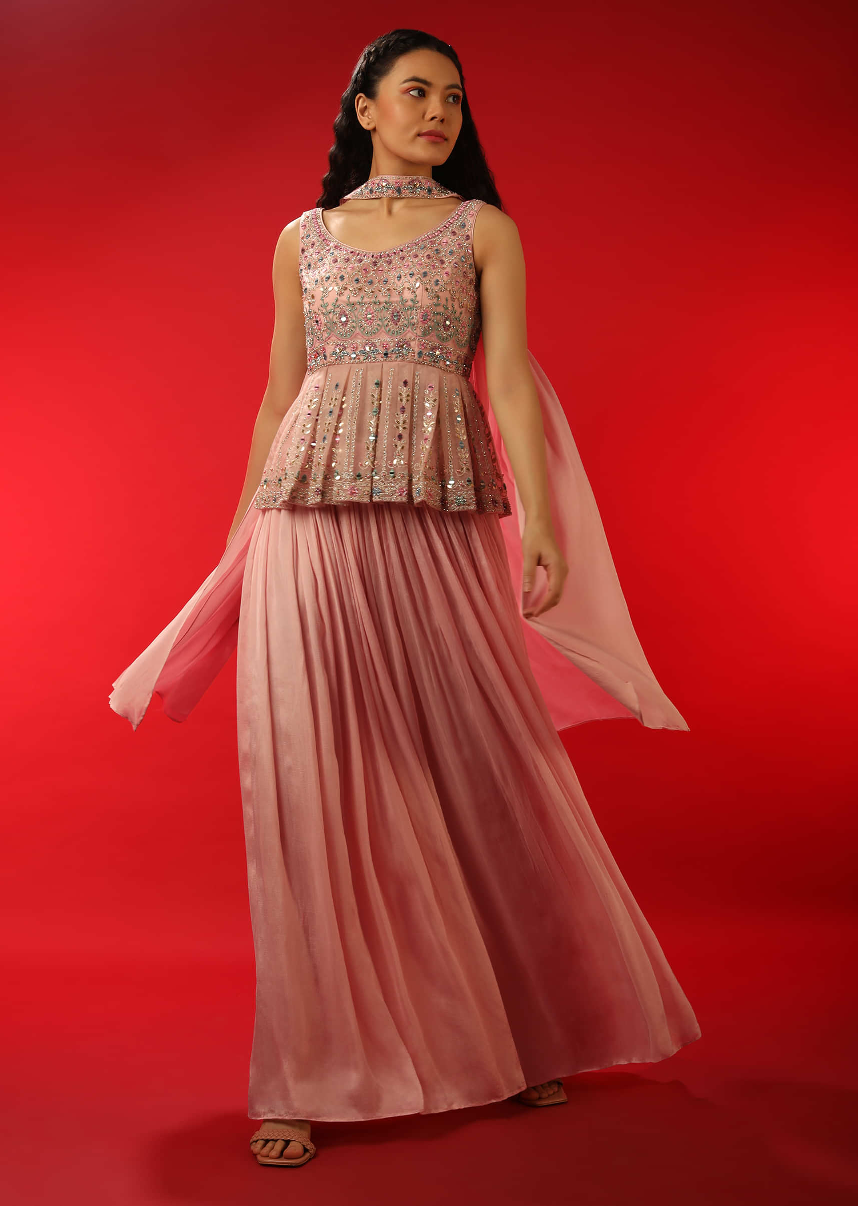 Pastel Pink Palazzo And Peplum Suit With Multi Colored Resham And Mirror Abla Embroidered Floral Motifs  