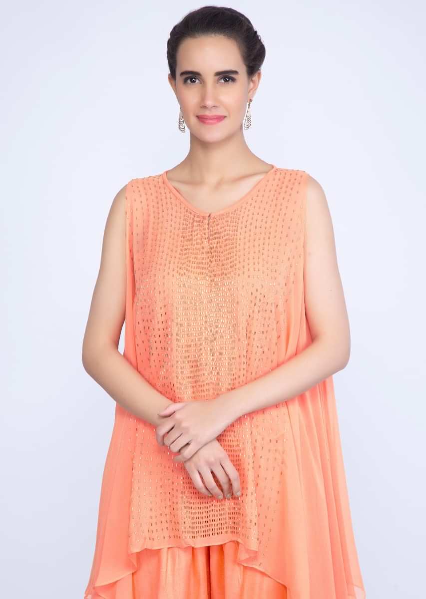 Peach assymetric cut dana embroidered top with matching santoon dhoti  pant only on kalki