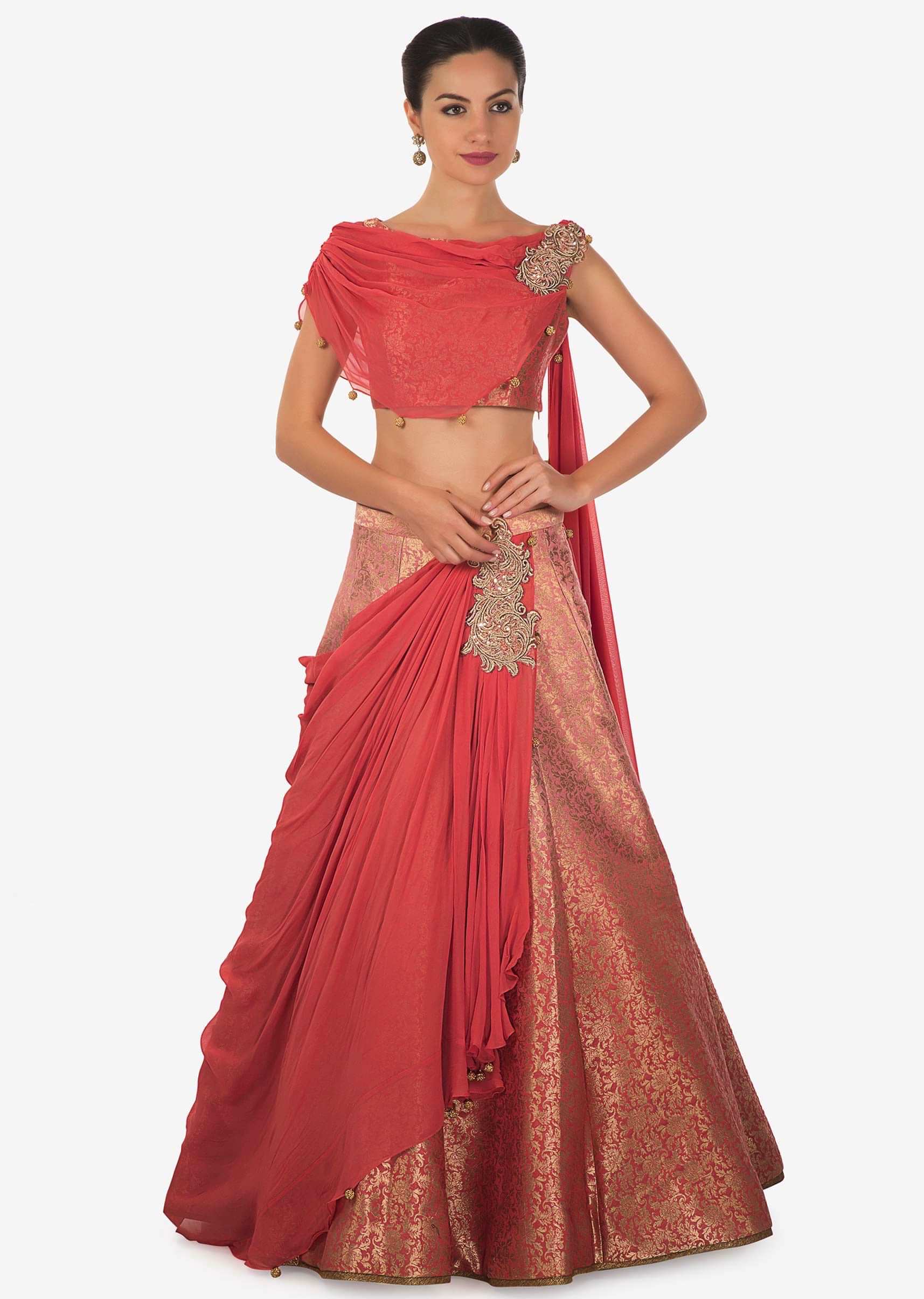 Peach brocade lehenga with pre stitched drape highlighted in zari and sequin butti only on Kalki
