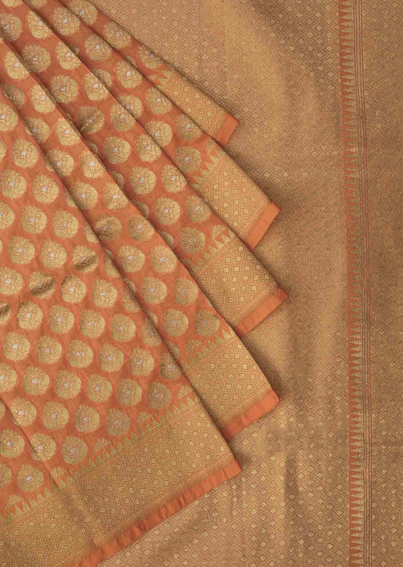 Peach chanderi silk saree with weaved butti and geometric motif pallav border