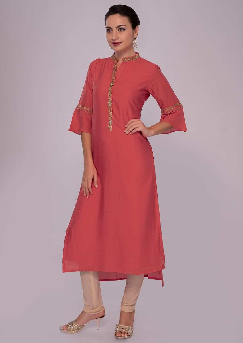 Peach cotton kurti with embroidered edges 