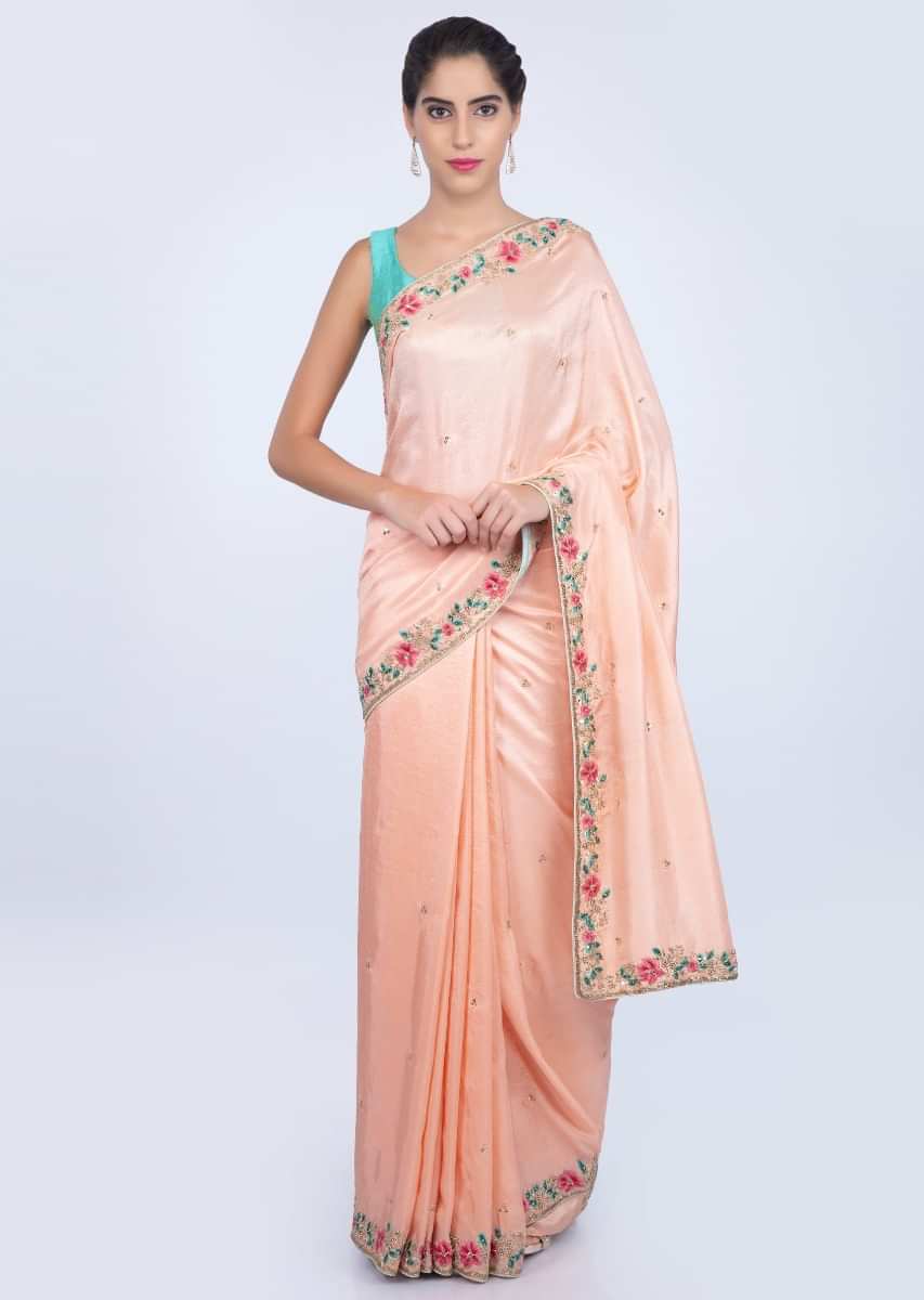 Peach dupion silk saree with embroidered butti and border only on kalki