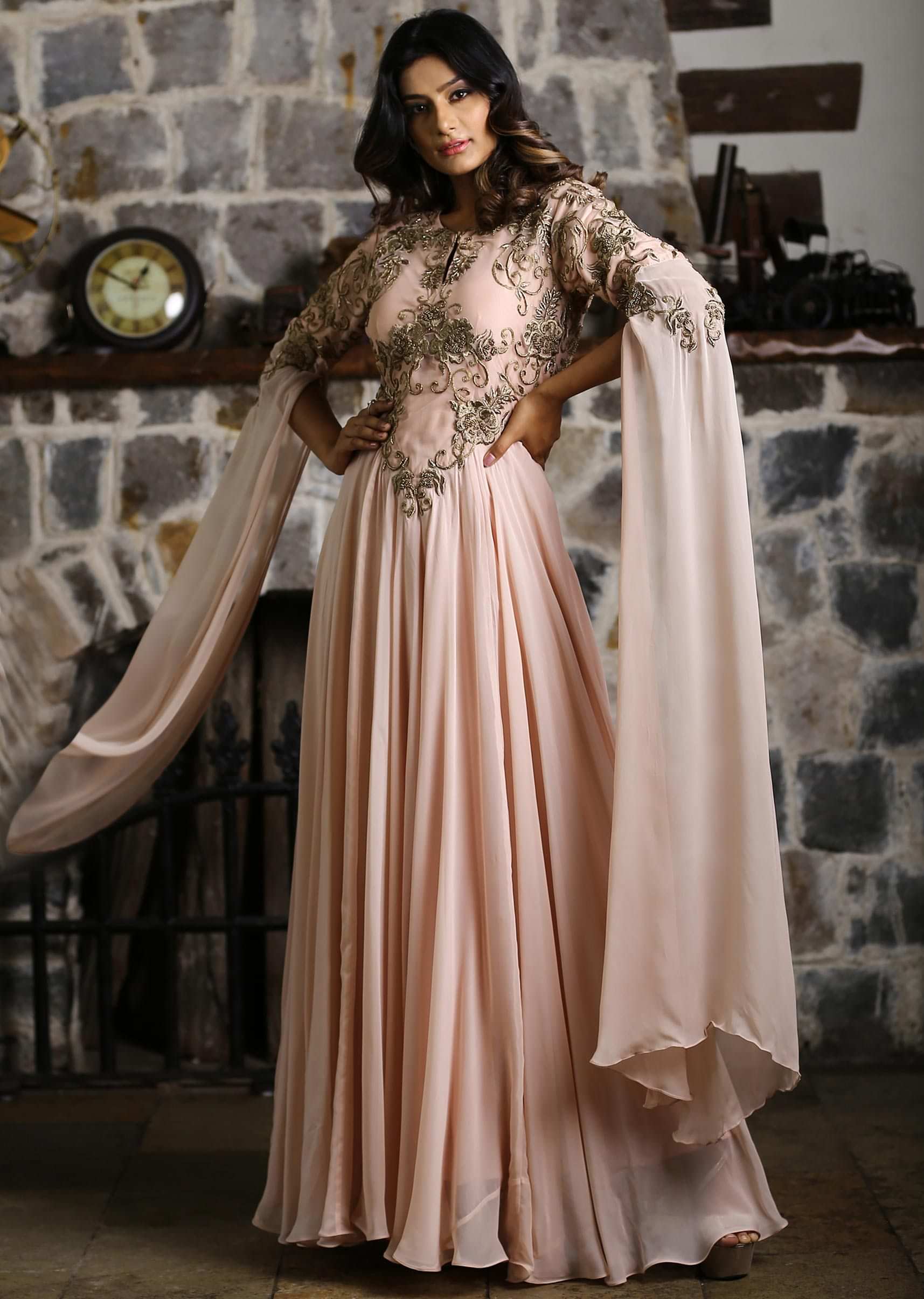 Peach georgette gown embroidered net bodice
