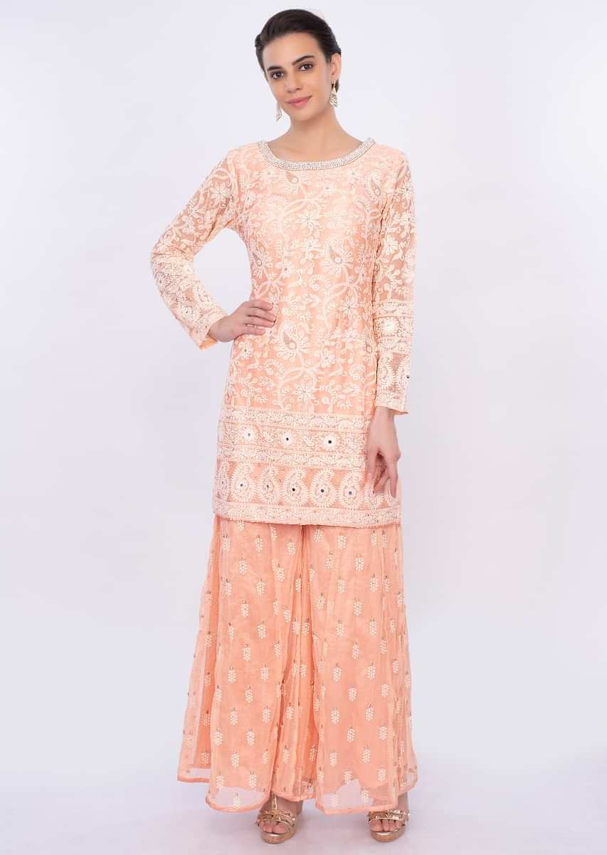 Peach net embroidered palazzo suit set only on Kalki