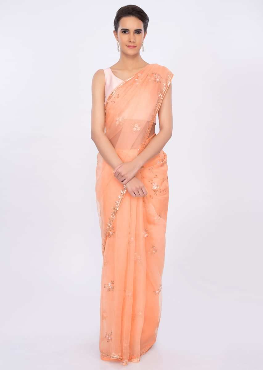 Peach organza saree with floral embroidered pallo and border only on kalki