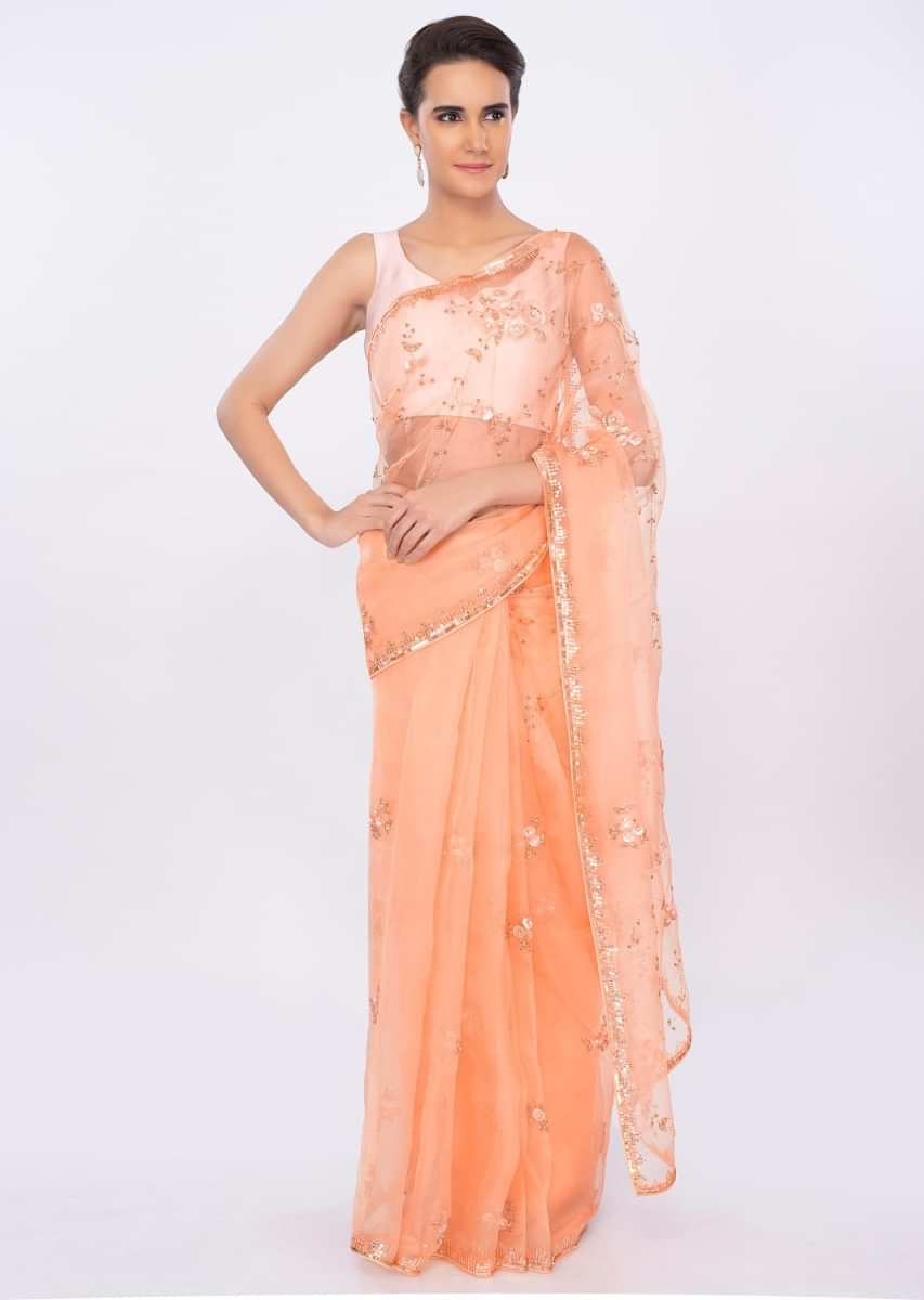 Peach organza saree with floral embroidered pallo and border only on kalki