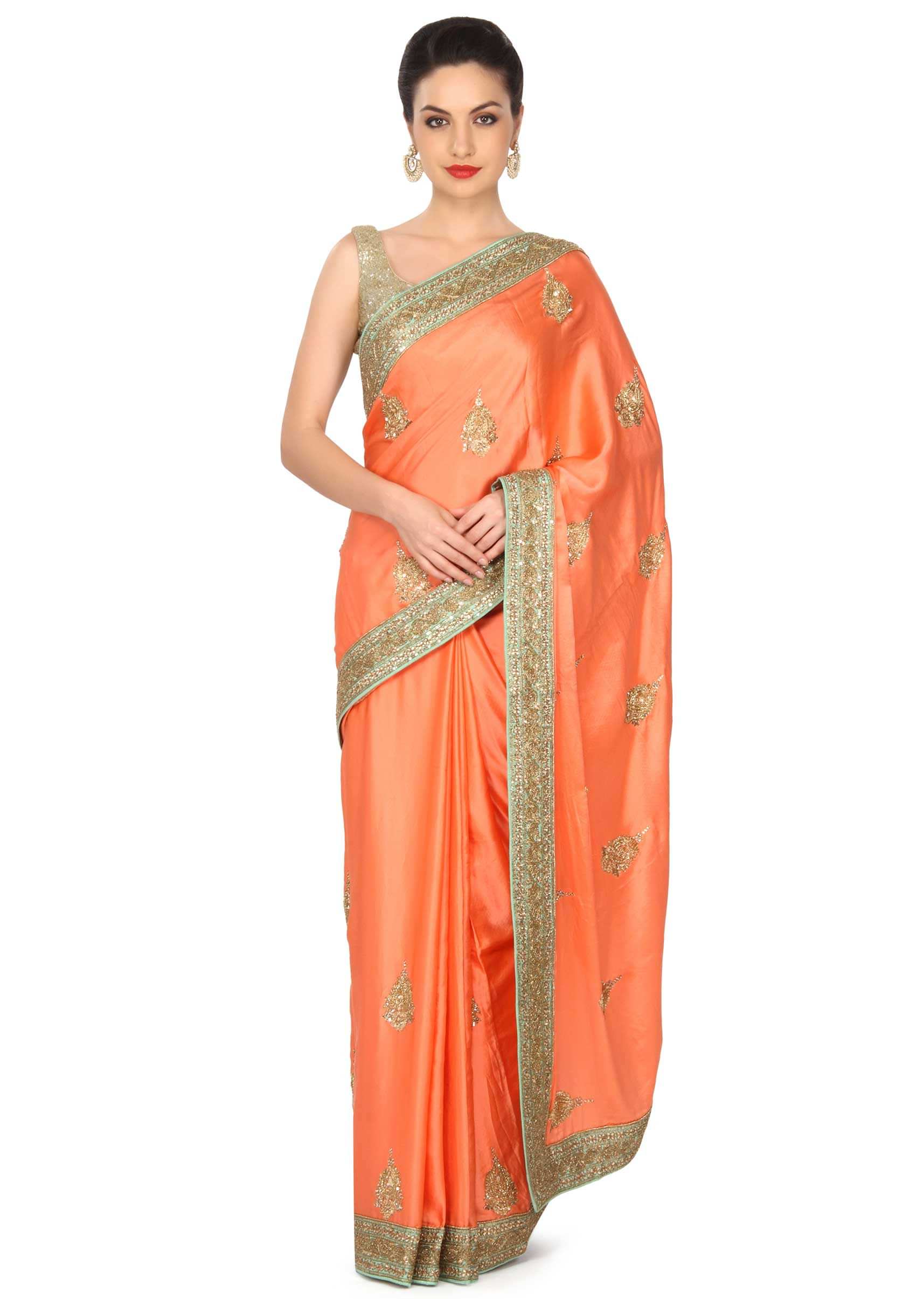 Peach saree adorn in sequin and kundan embroidery only on Kalki