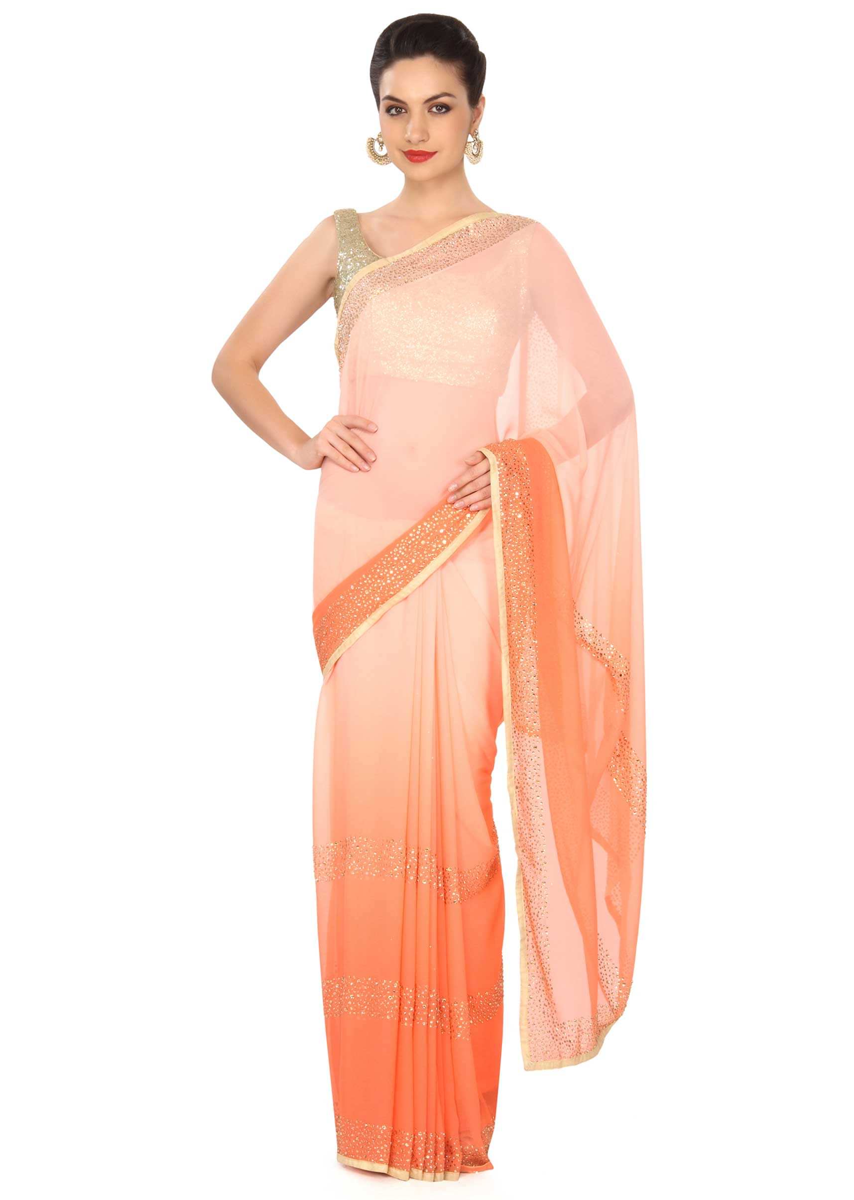 Peach shaded saree adorn in kundan embroidered border only on Kalki