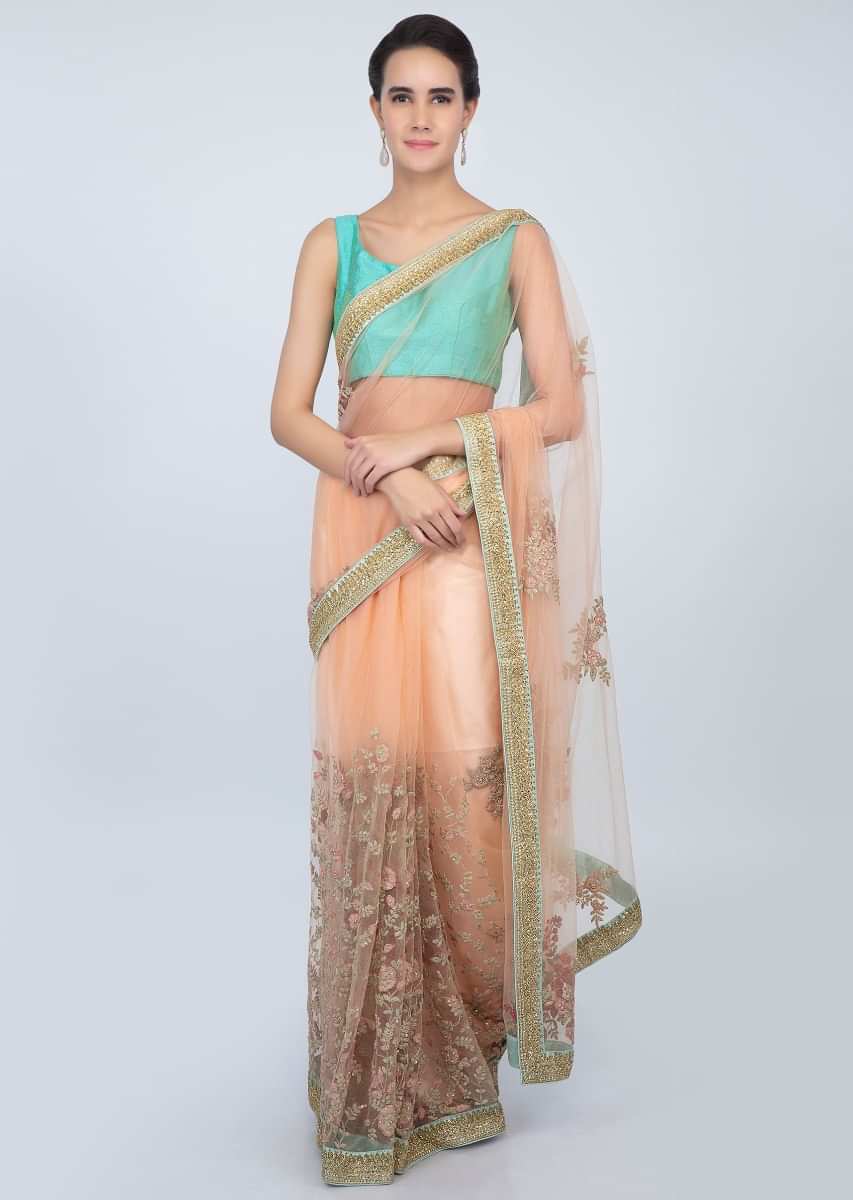 Peach sheer net saree with in floral embroidery and butti only on kalki