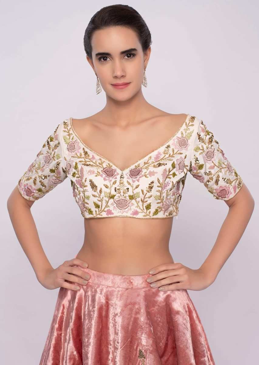 Peach Lehenga In Hand Embroidered Velvet With Cream Embroidered Blouse And Peach Organza Ruffled Dupatta Online - Kalki Fashion