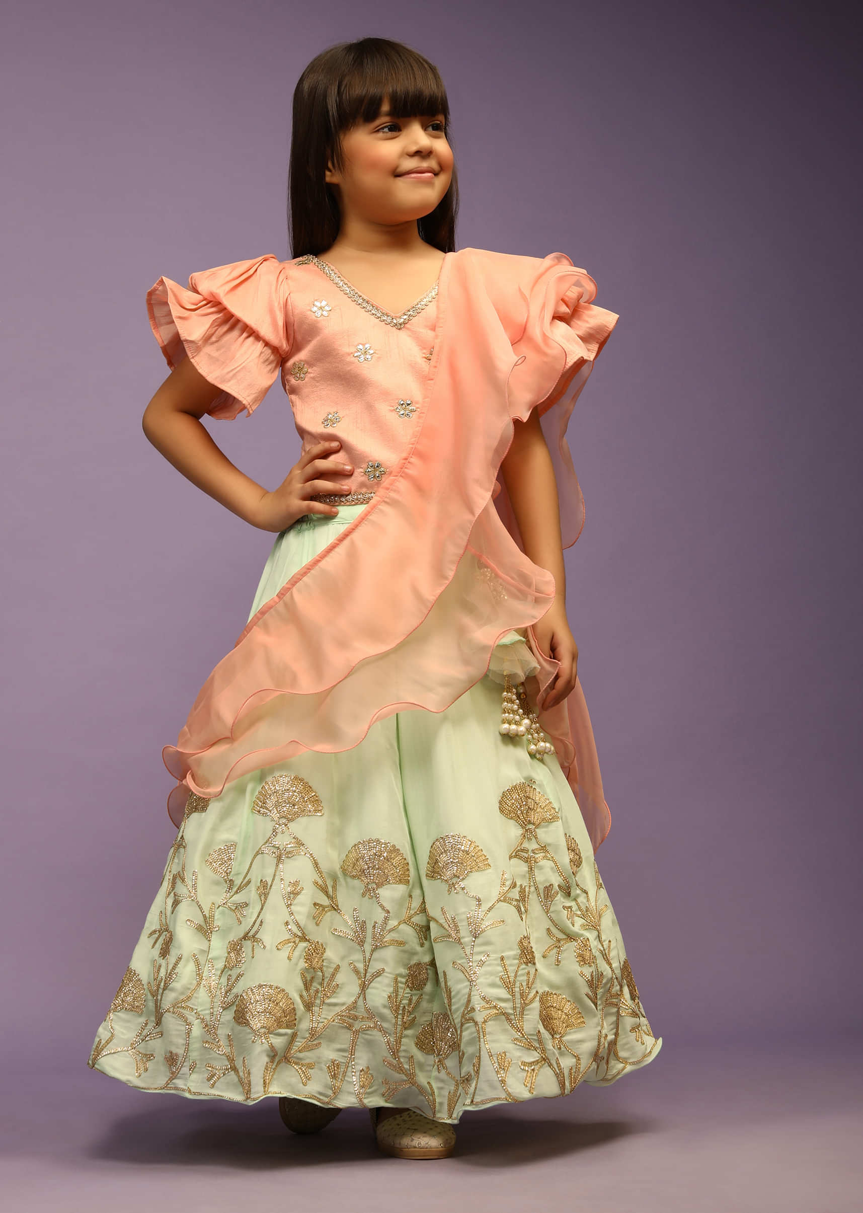 Kalki Girls Peach and green lehenga choli with embroidered flowers and balloon sleeves by fayon kids