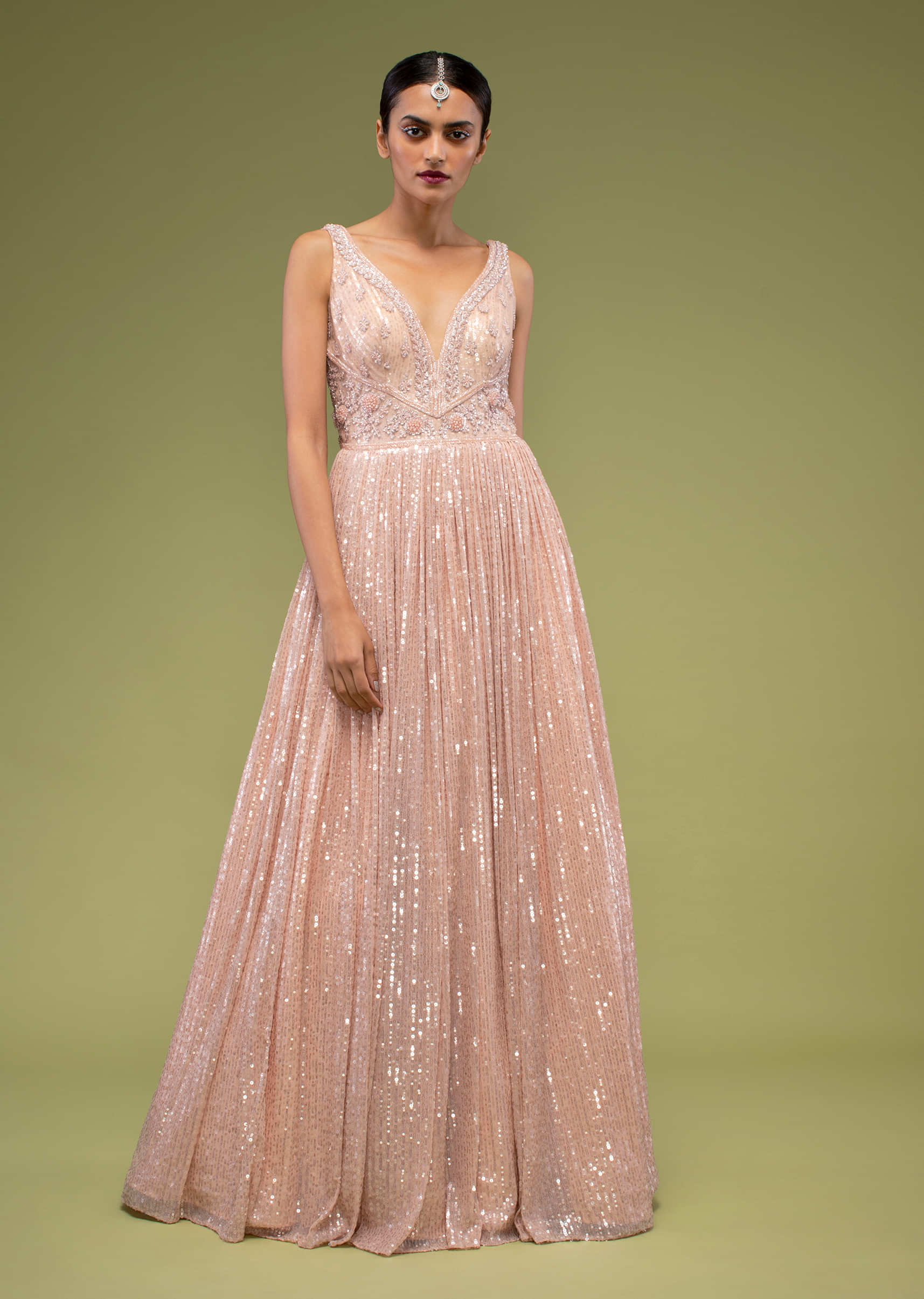 Peach Blush Gown In Sleeveless With Sequins Embroidery, Comes In A Sweetheart Neckline With Floral Embroidered Buttis