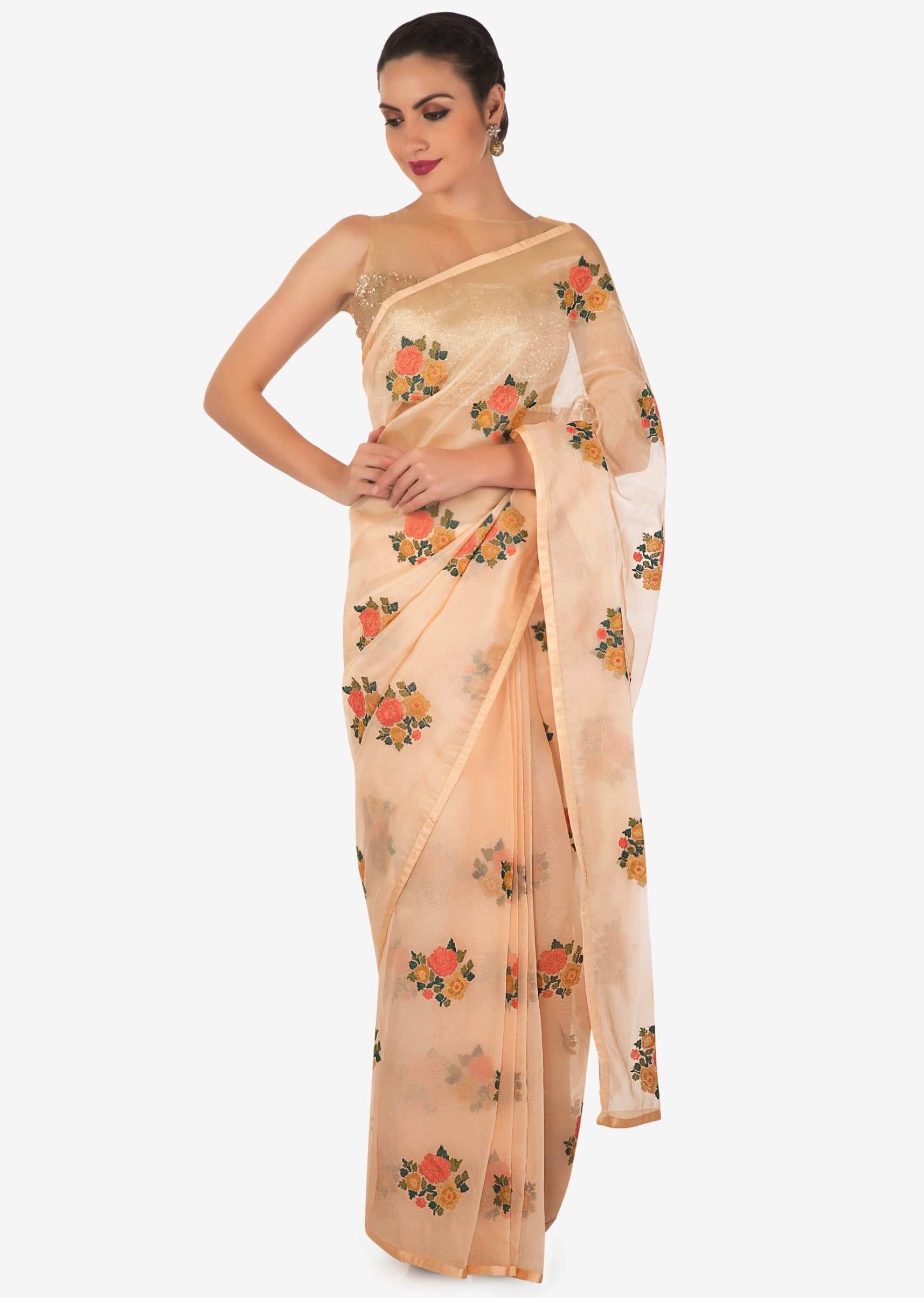 Peach cream saree in tissue silk with resham embroidered butti only on Kalki
