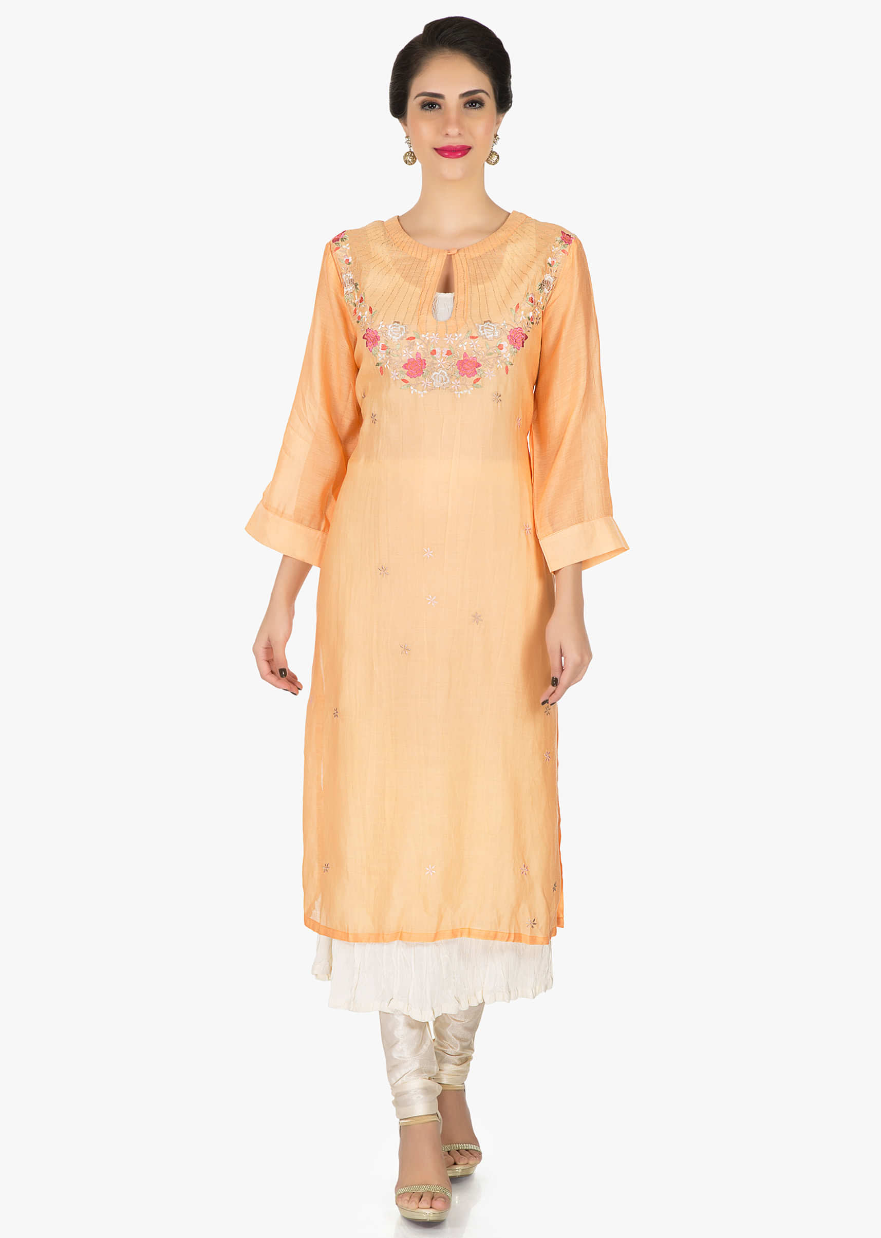 Peach dress in crush cotton enhanced in resham embroidery only on Kalki