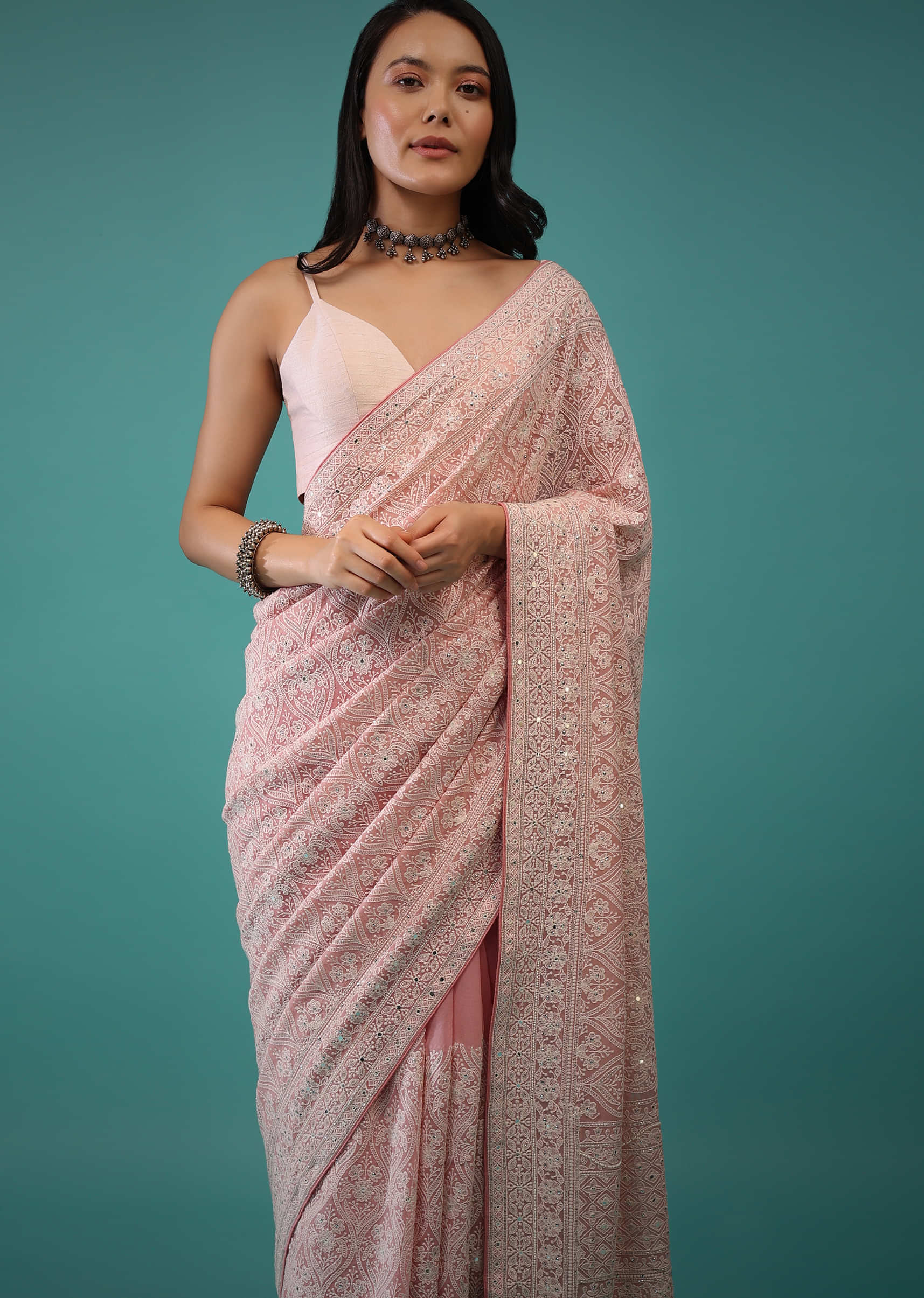 Peach Georgette Saree In Lucknowi Threadwork In A Moroccan Jaal, It Has Sequins, Cut Dana Embroidery Buttis On The Pallu 