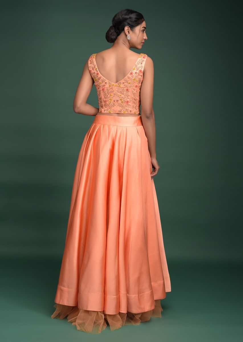 Peach Lehenga In Milano Satin With Pleated Overlapping Layer And Embroidered Corset Online - Kalki Fashion