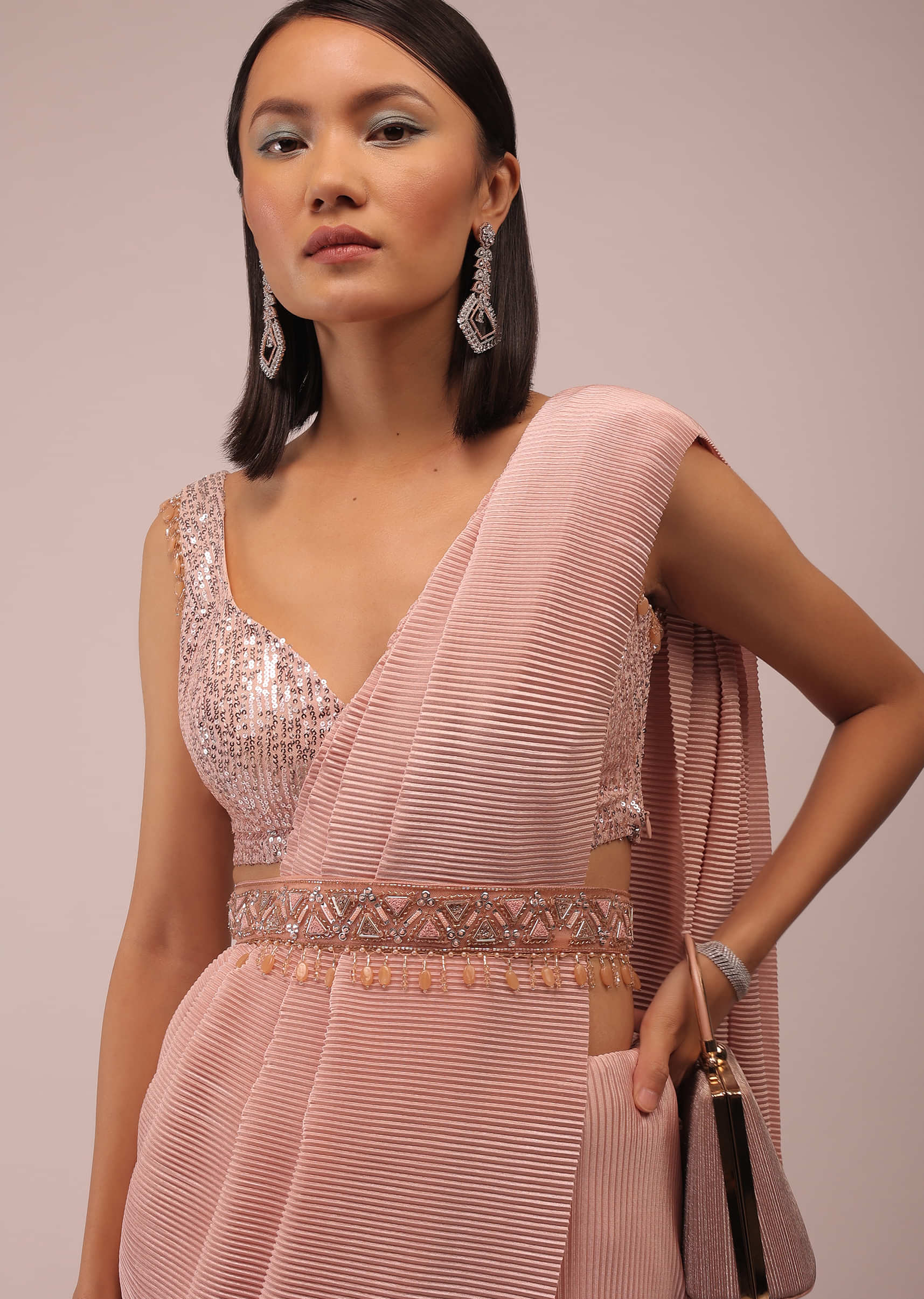 Peach Saree With A Crop Top Crafted In Net With Sequins Embroidery