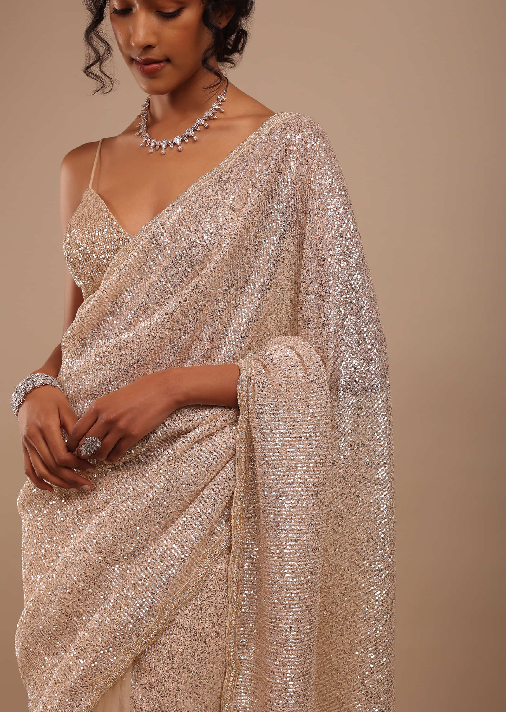 Peach Shimmer Saree In Gold Sequins And Stones Embroidery With Beads And Stones On The Pallu Border