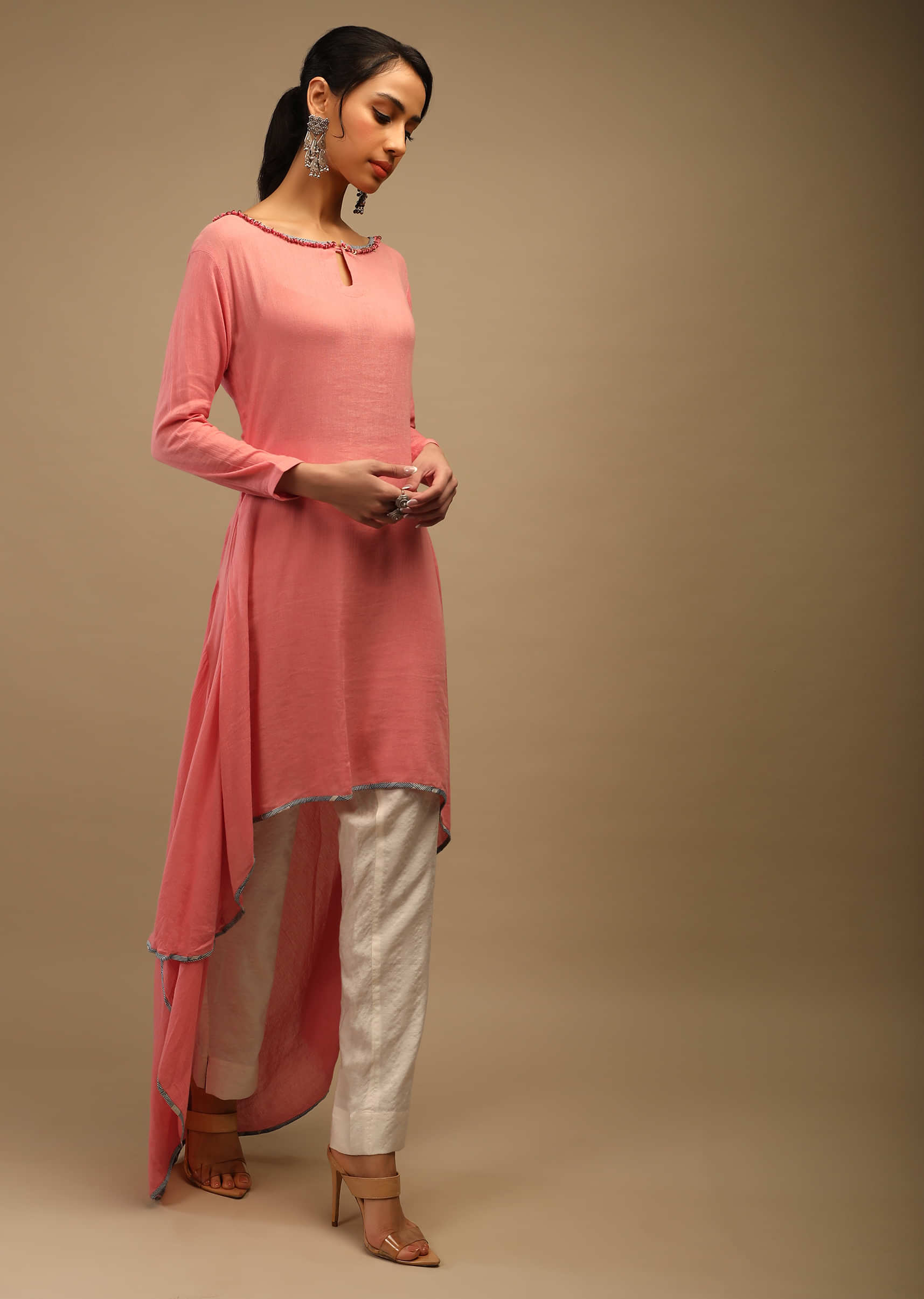 Peach Tunic In Chiffon With High Low Hemline And Sequins Work On The Neckline 