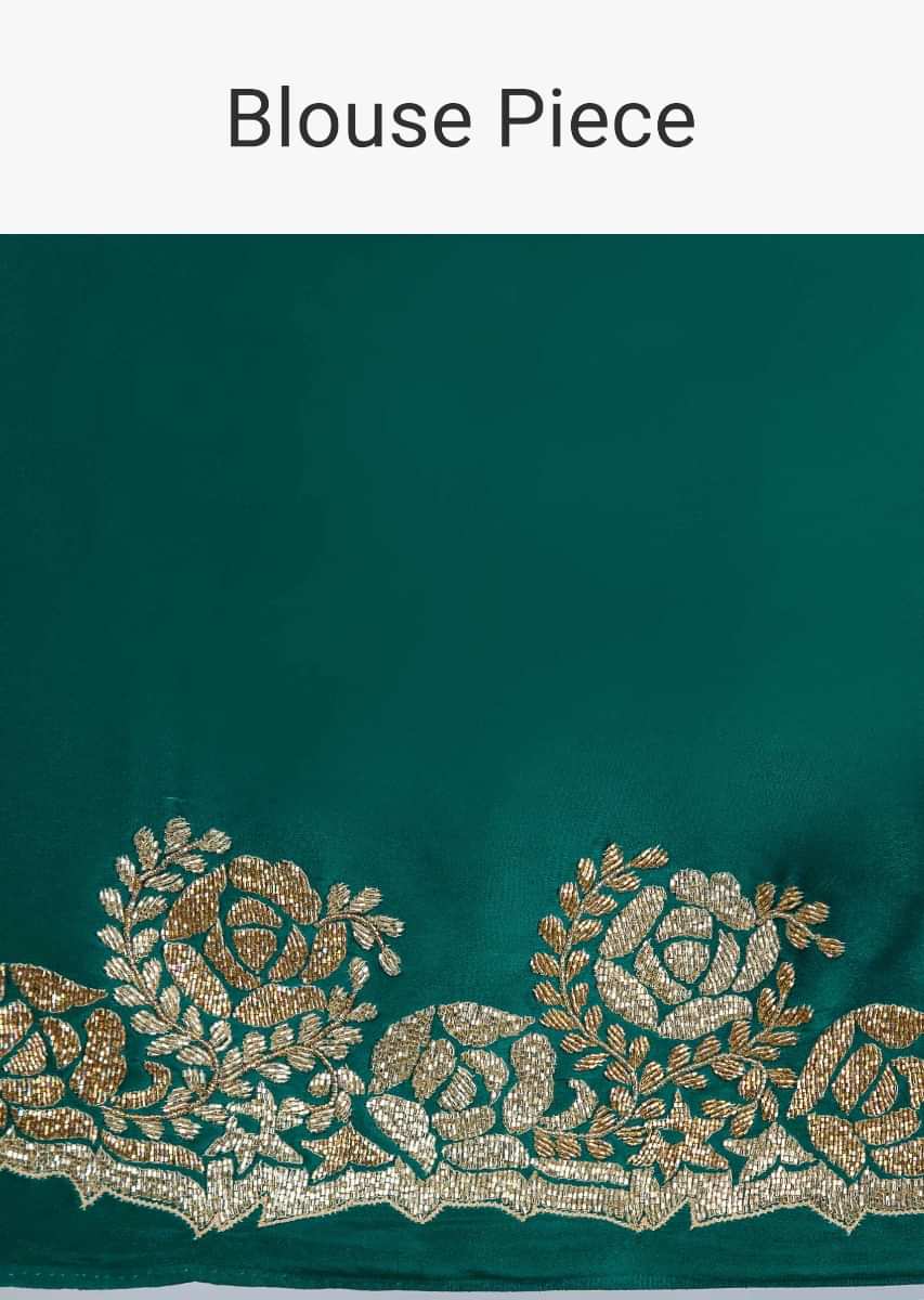 Peacock green satin saree with cut dana floral embroidered border only on Kalki