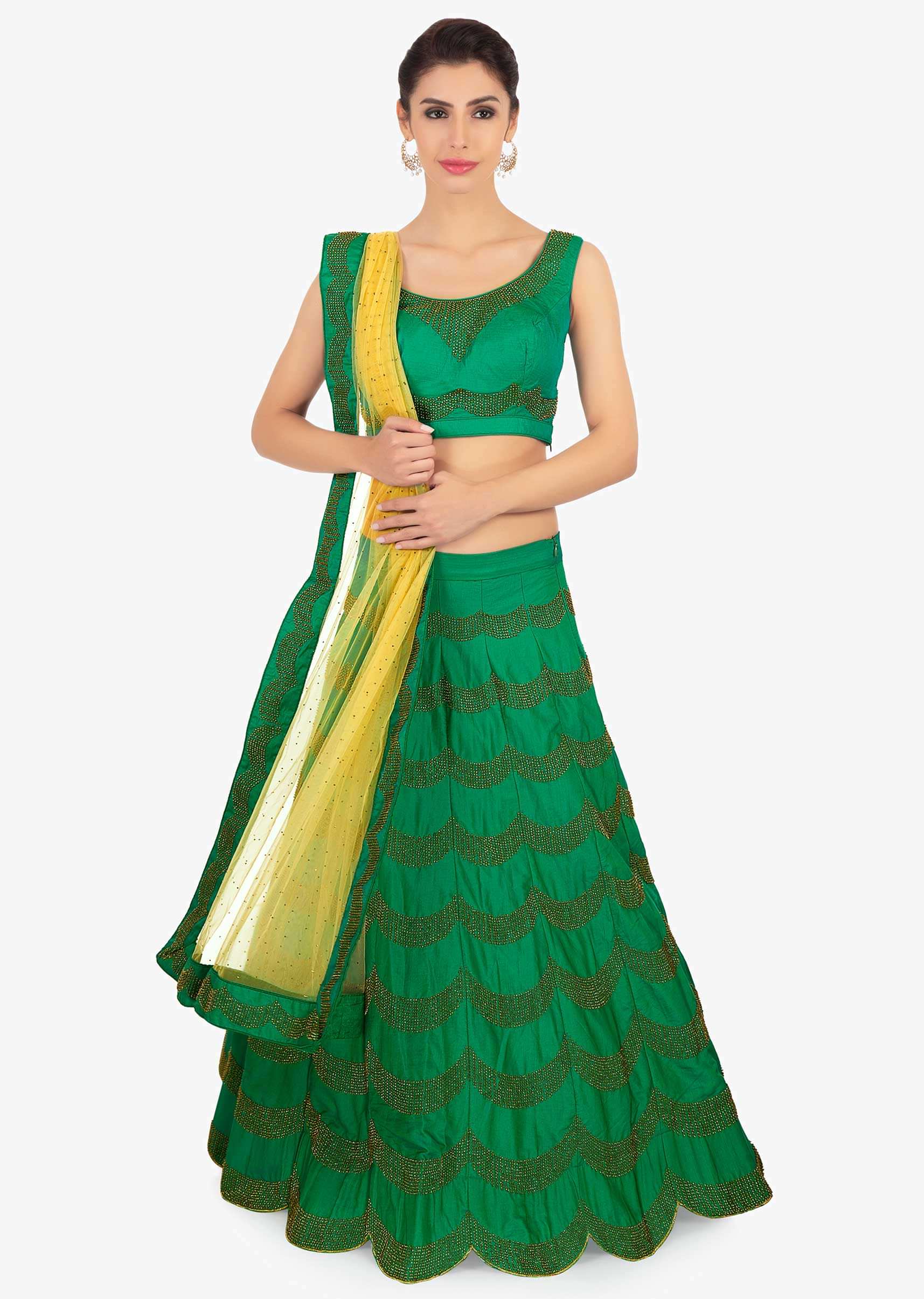 Peacock green silk lehenga and blouse with beige net dupatta only on Kalki