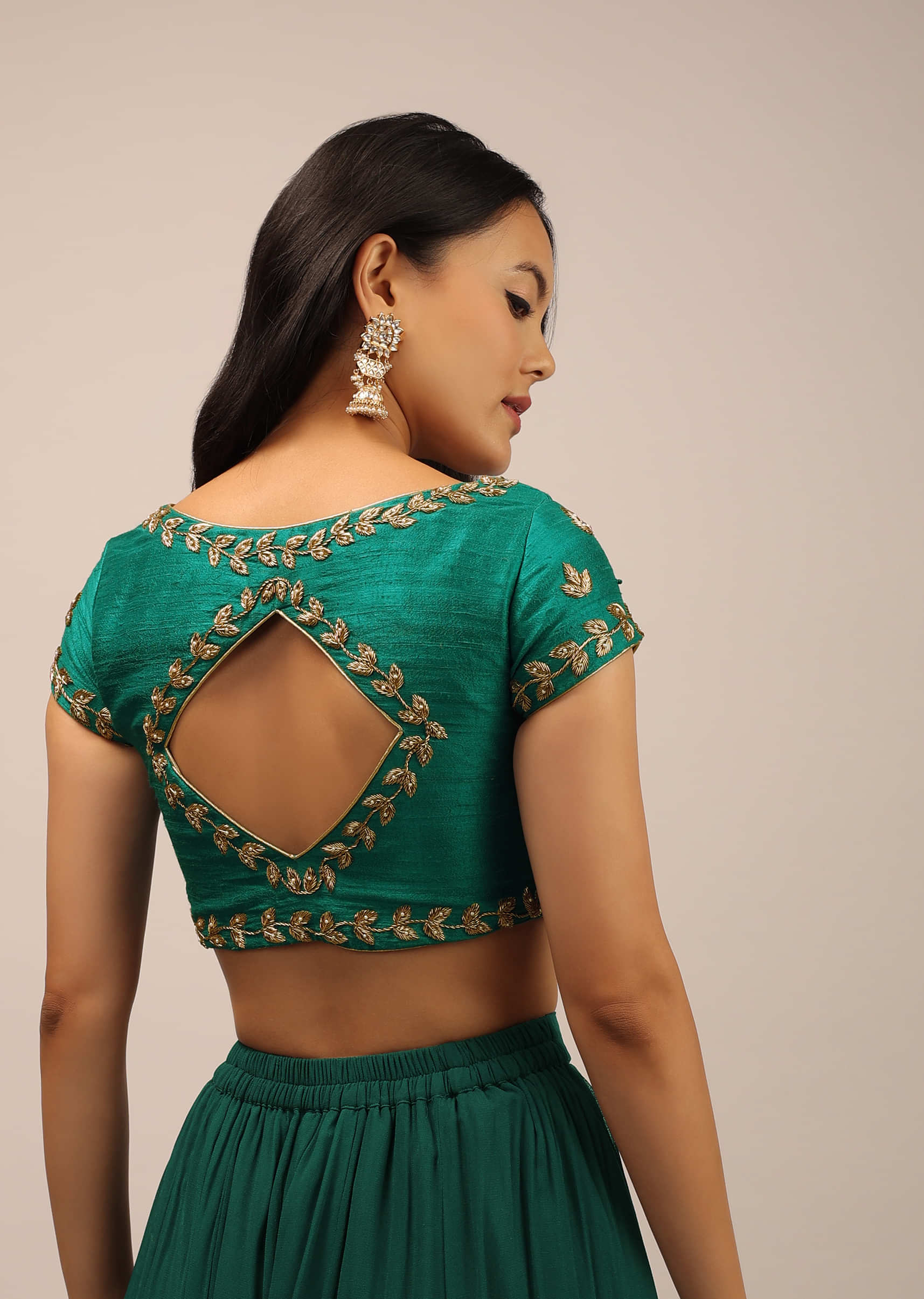 Peacock Green Blouse In Raw Silk With Zardosi Embroidery And A Diamond Cut Out On The Back
