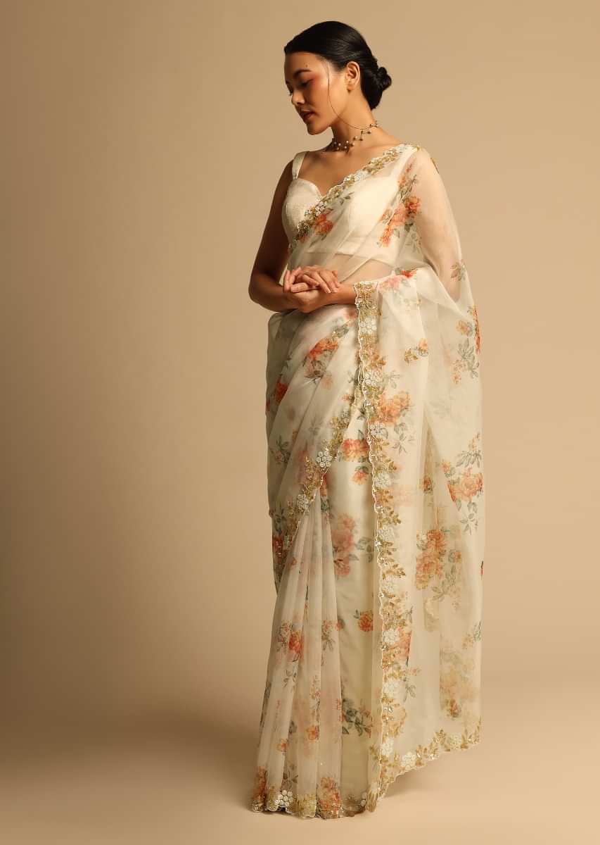 Pearl White Saree In Organza With Floral Print All Over And Moti Embroidered Border Along With Unstitched Blouse