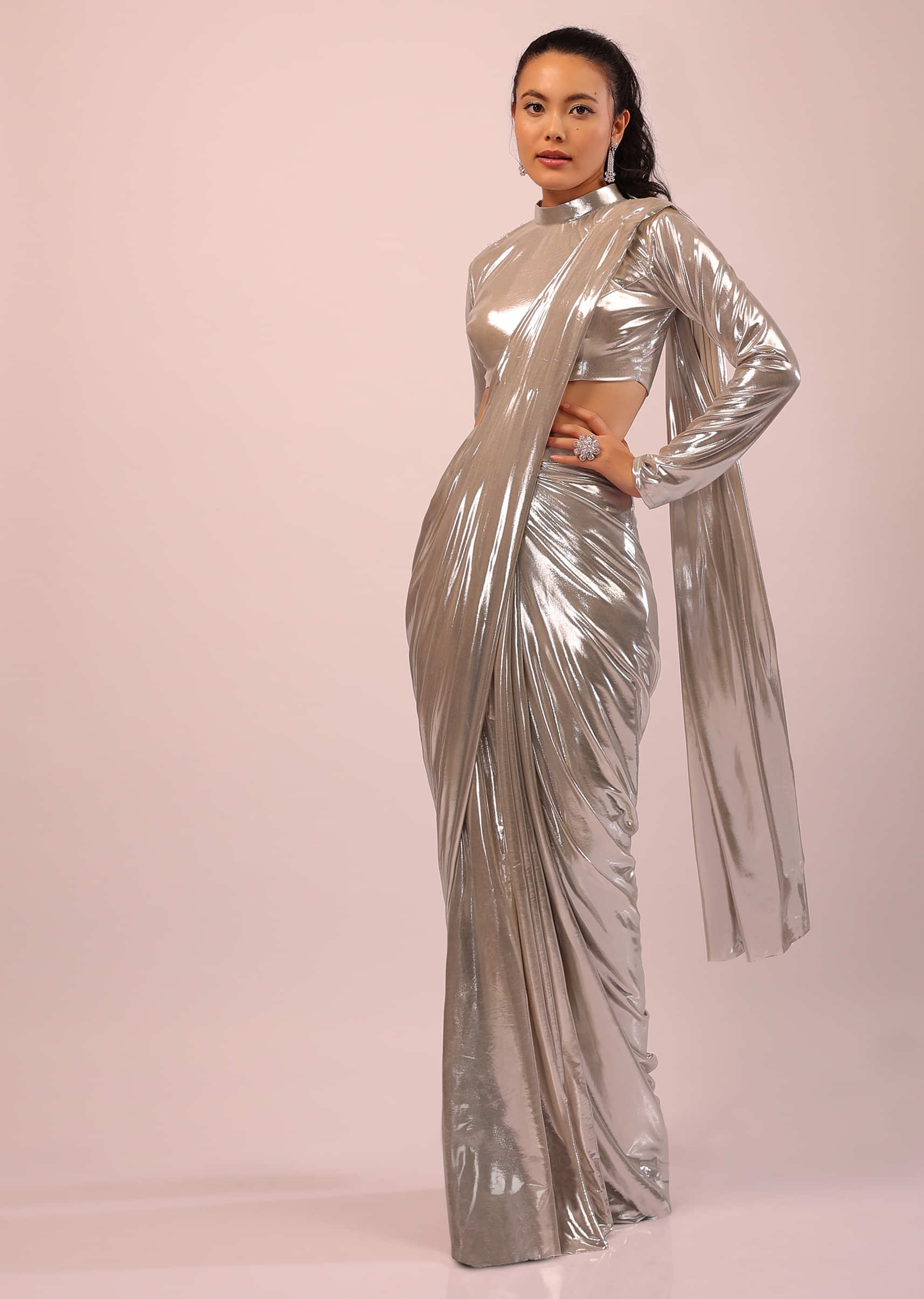 Pearl Ready Pleated Saree In Metallic Lycra With A High Neck Blouse Having Elegant Full Sleeves