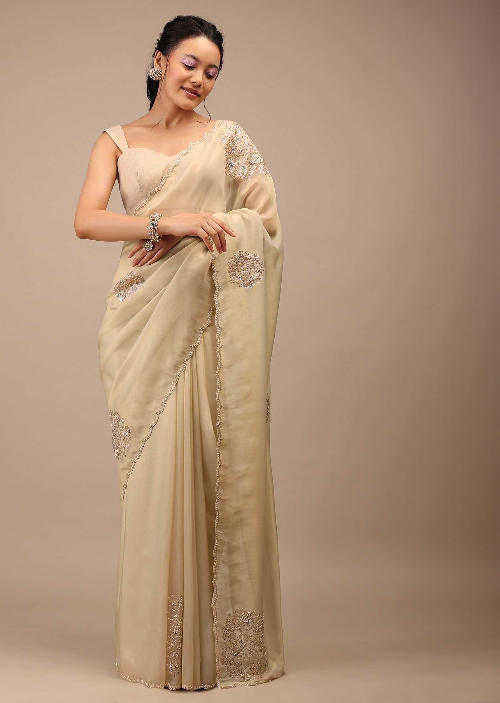 Pebble Brown Glass Tissue Saree Adorned With Floral Buttis, Zardosi Embroidery And 3D Sequins