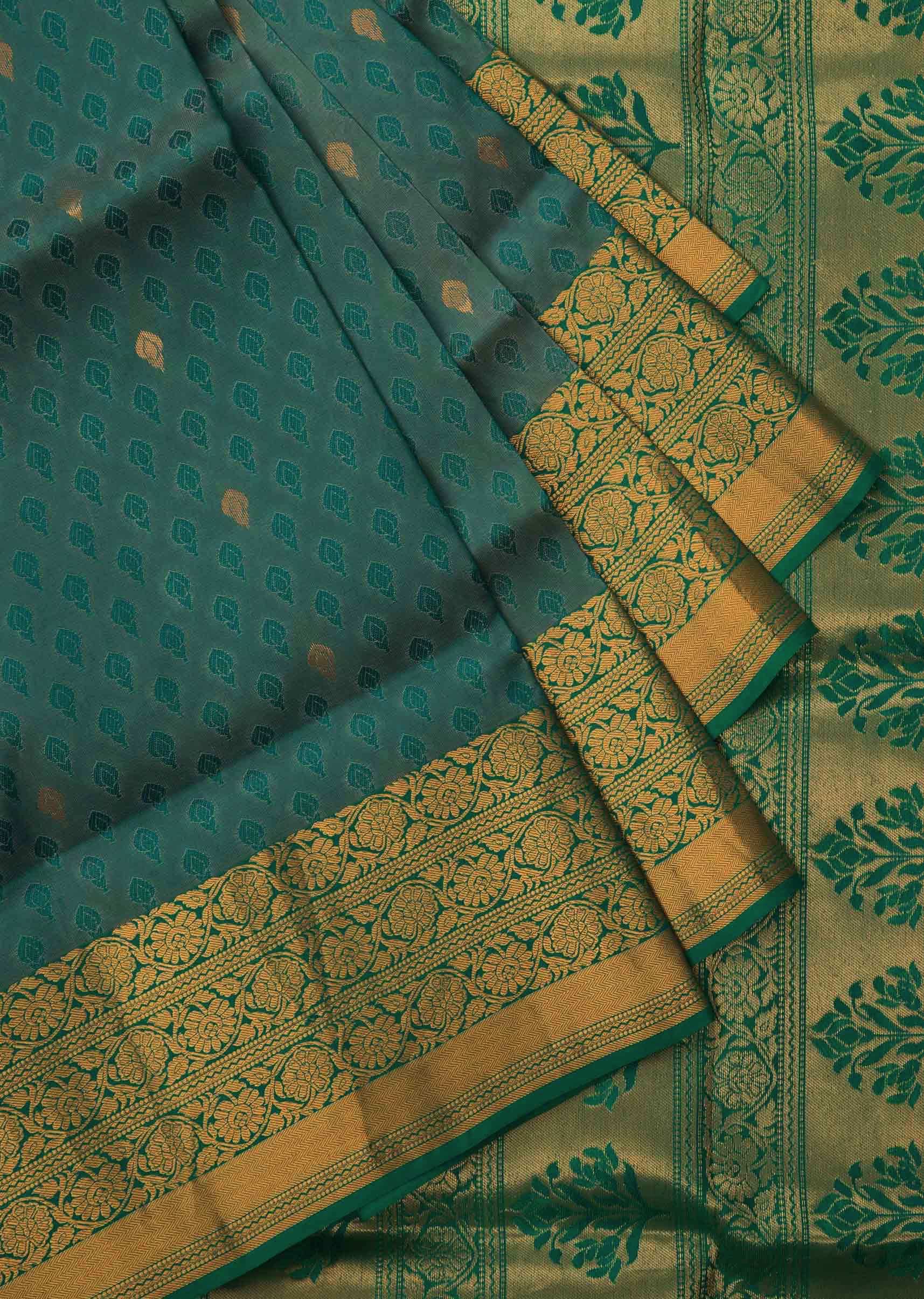 Peocock saree in silk beautified in weaved embroidery only on Kalki