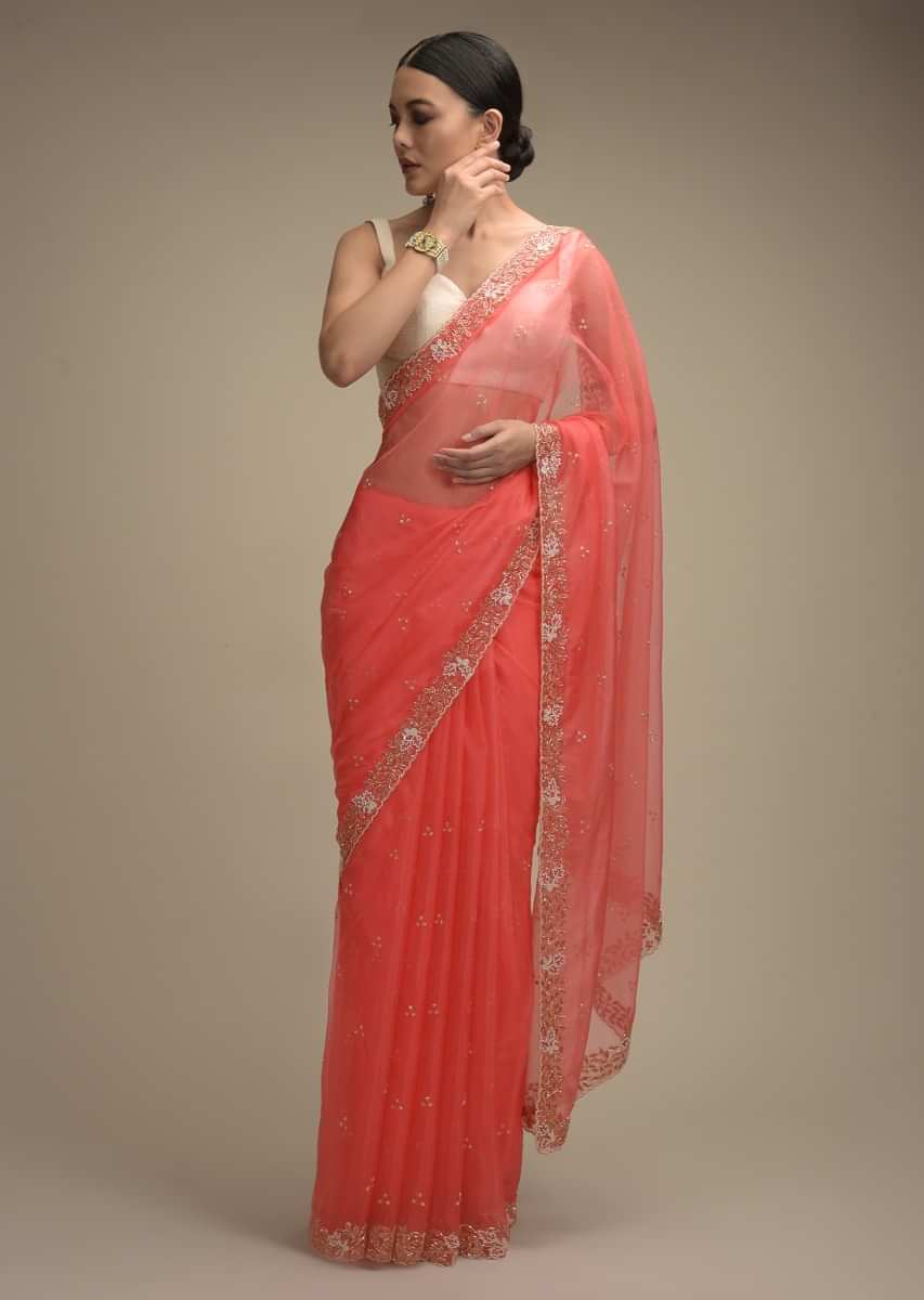 Persian Pink Saree In Organza With Hand Embroidered Floral Floral Border And Scattered Buttis  
